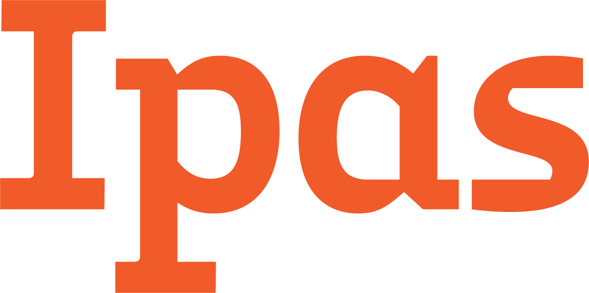 Close-up of the orange and black logo of the New York Giants football team with the letters 'Giants'.