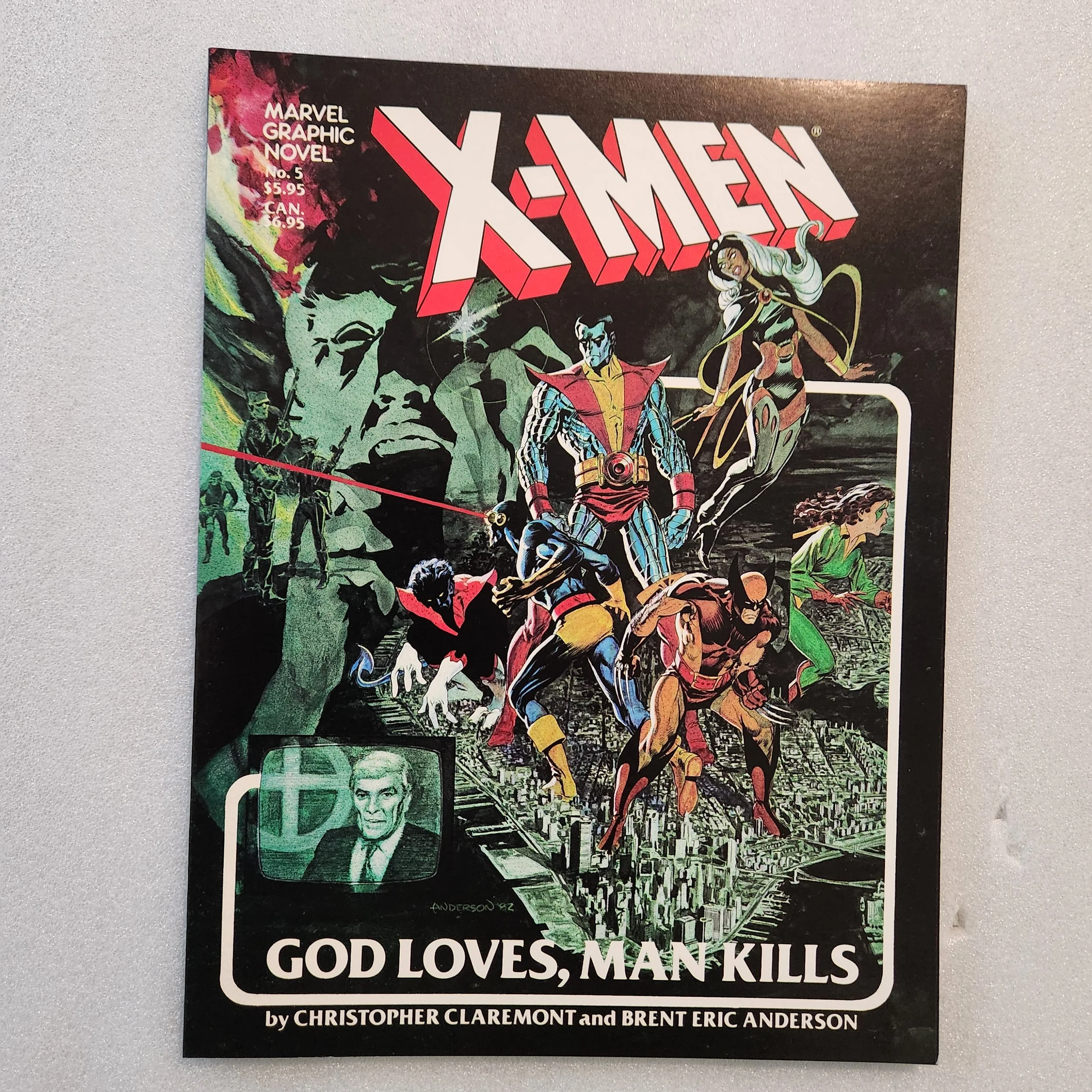 Marvel Graphic Novel: X-Men - God Loves, Man Kills (NM/Mint)