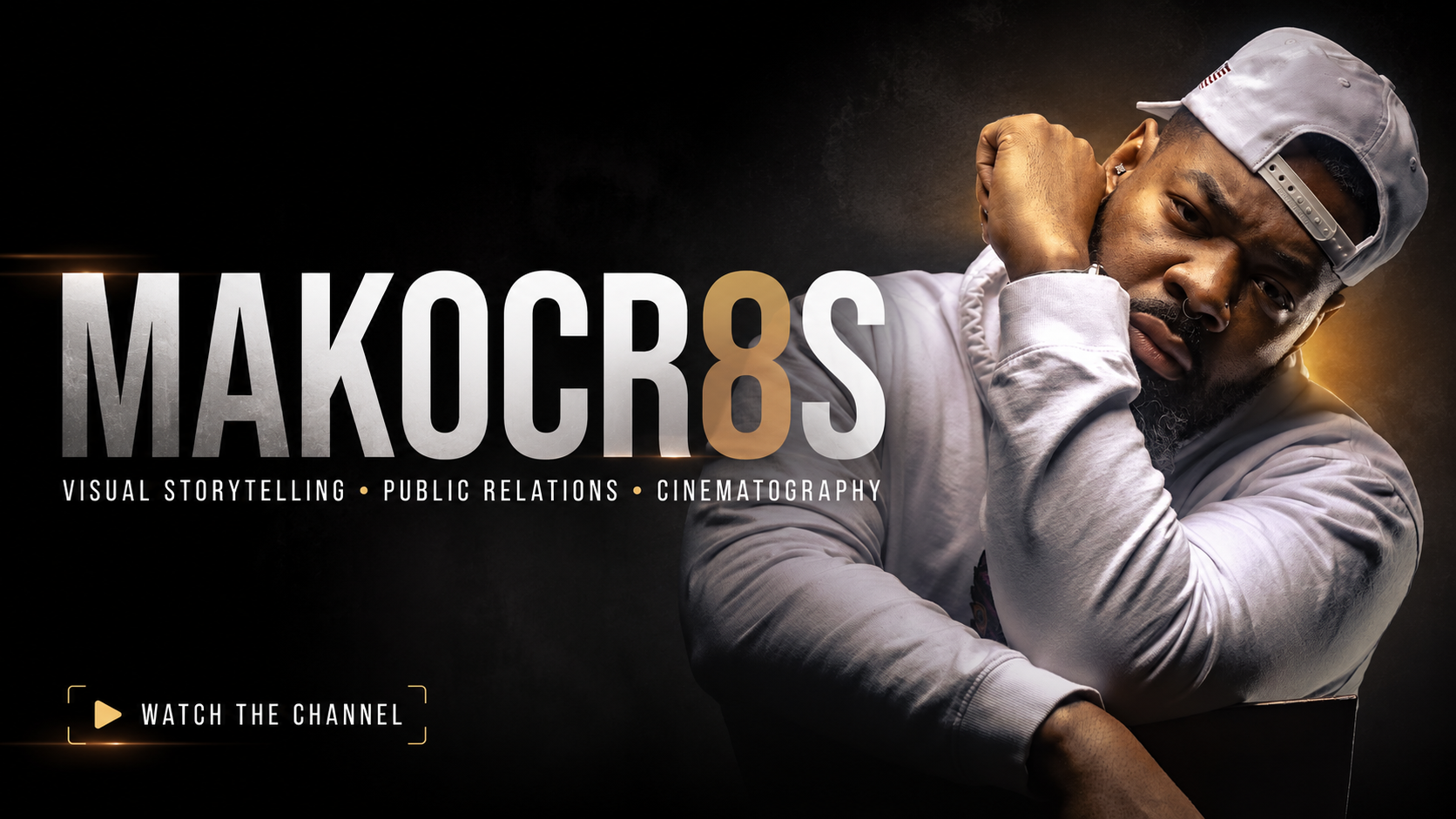 A promotional graphic for Makors8S featuring a man with a beard, wearing a gray cap backwards and a white jacket, posing with his fist near his face. The text highlights visual storytelling, public relations, and cinematography, with an option to watch the channel.