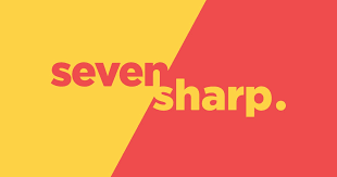 Graphic design with the words 'seven sharp.' split diagonally with yellow on the left and red on the right.