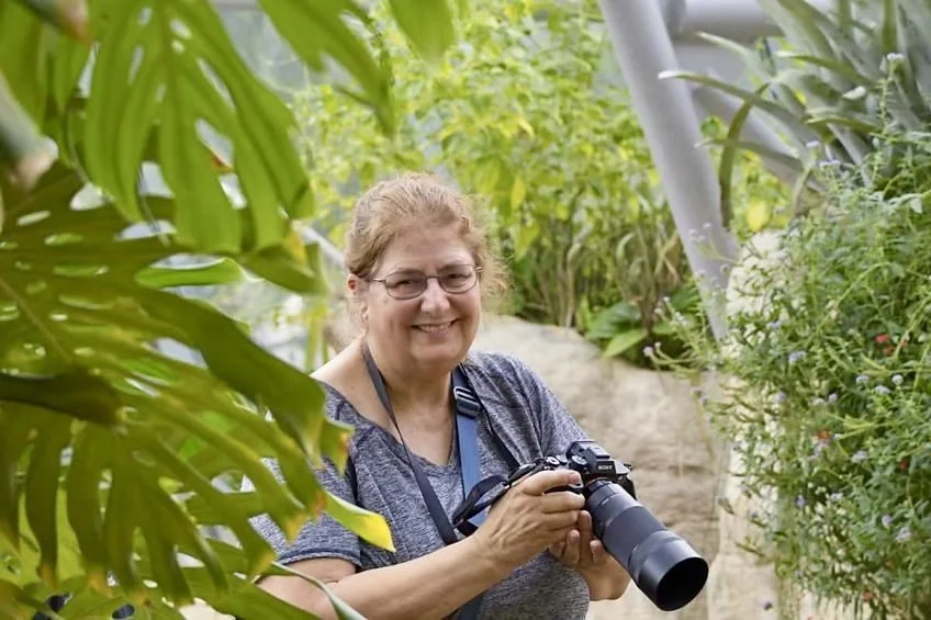 Jules Reagan with a camera