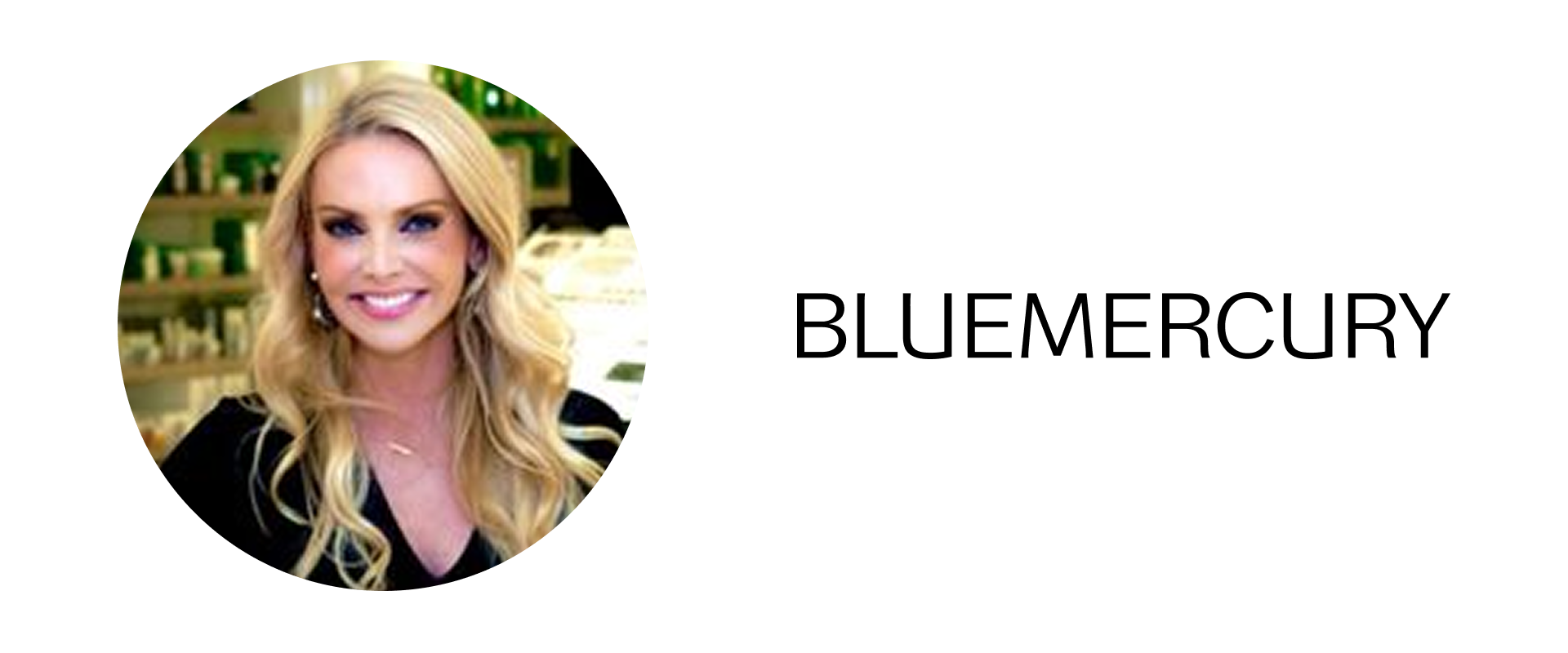 A woman with blonde hair and a black top smiling at the camera, with a damaged and pixelated banner that appears to be for a TV show or news program.