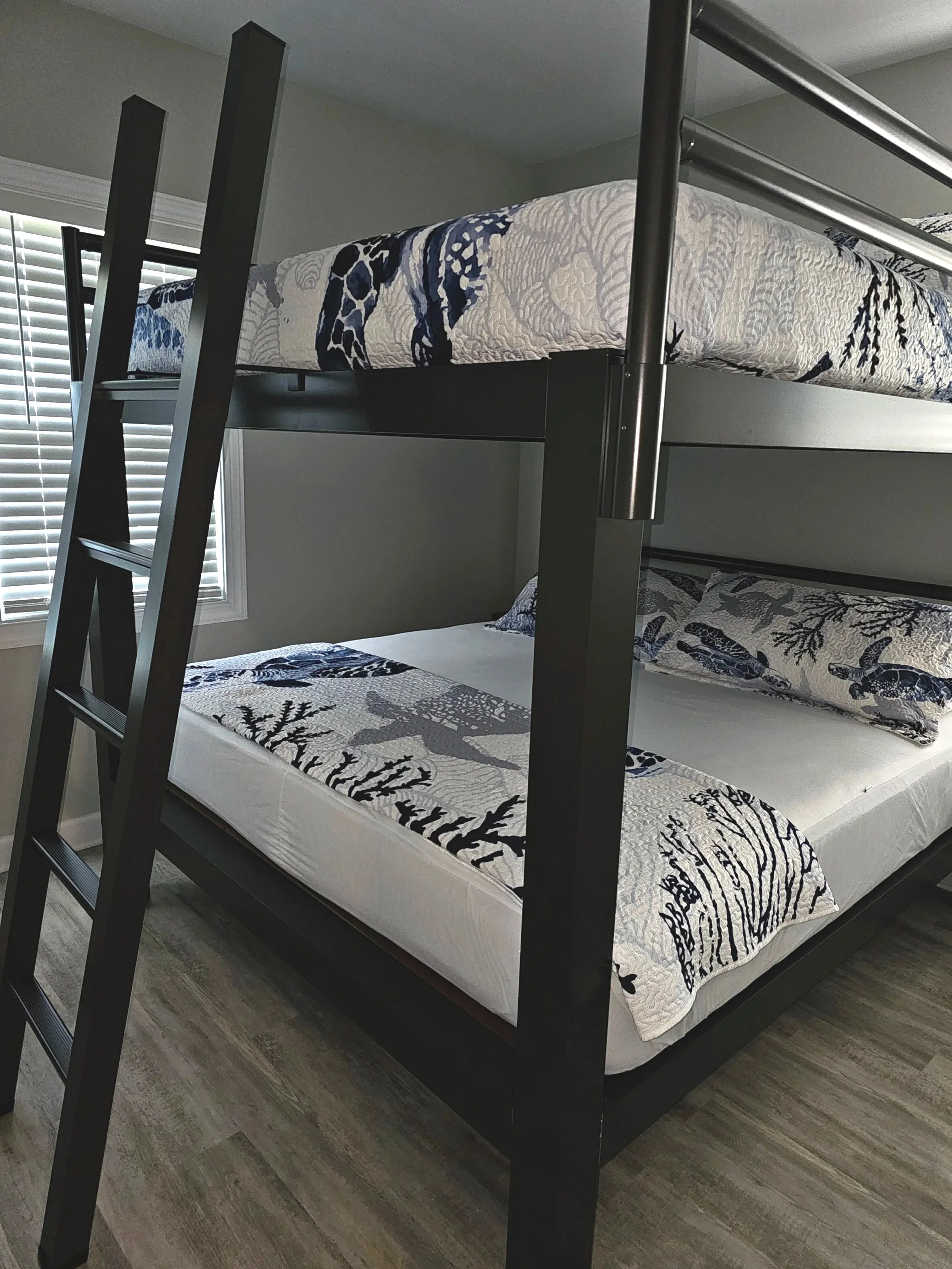 Clean and thoughtfully styled bedroom in a coastal NC home