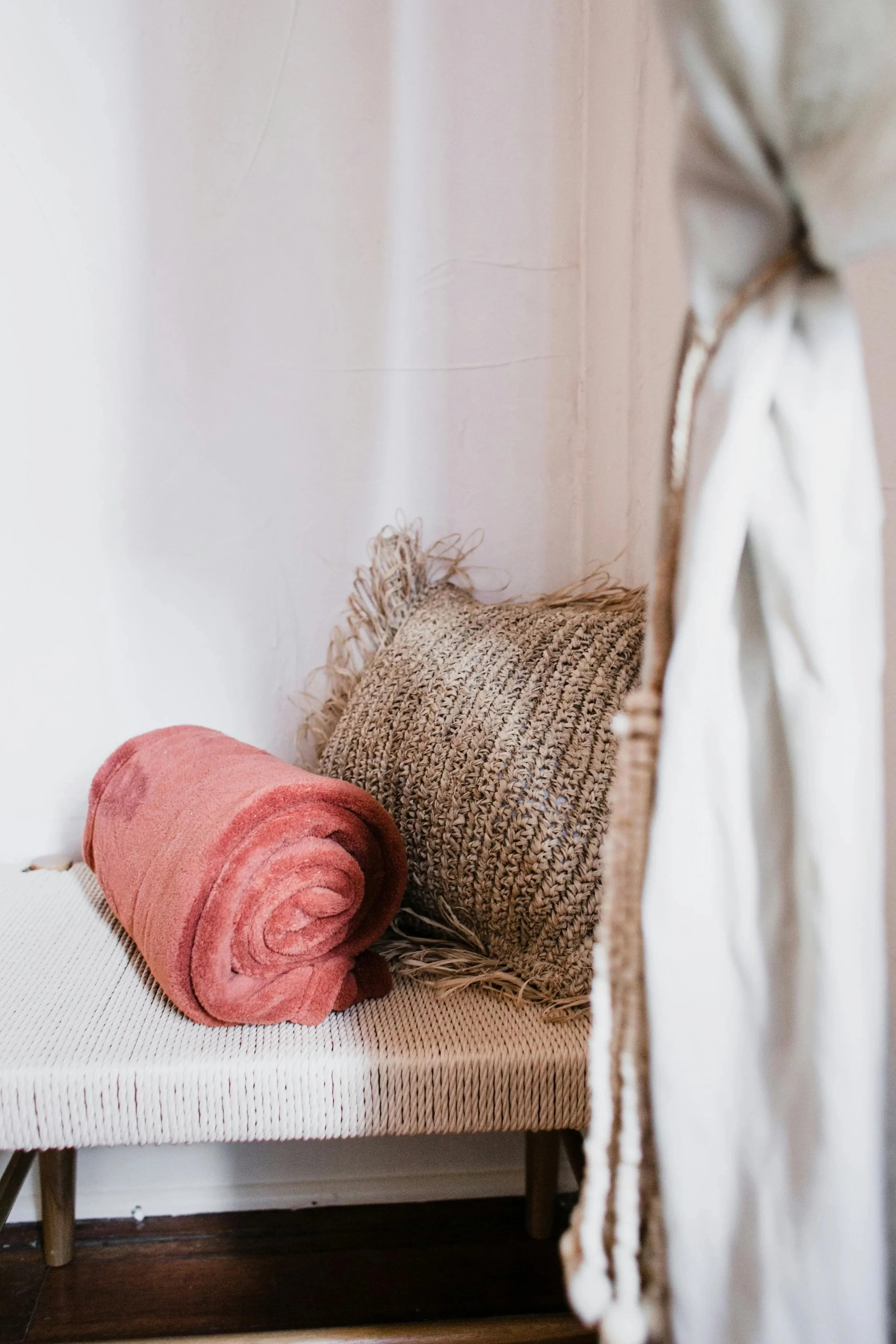 Thoughtfully staged throw blankets in a clean vacation rental home.