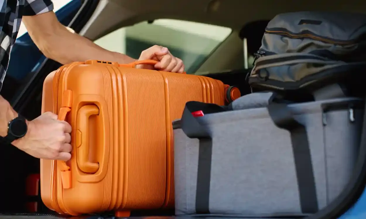 Luggage packed into a car