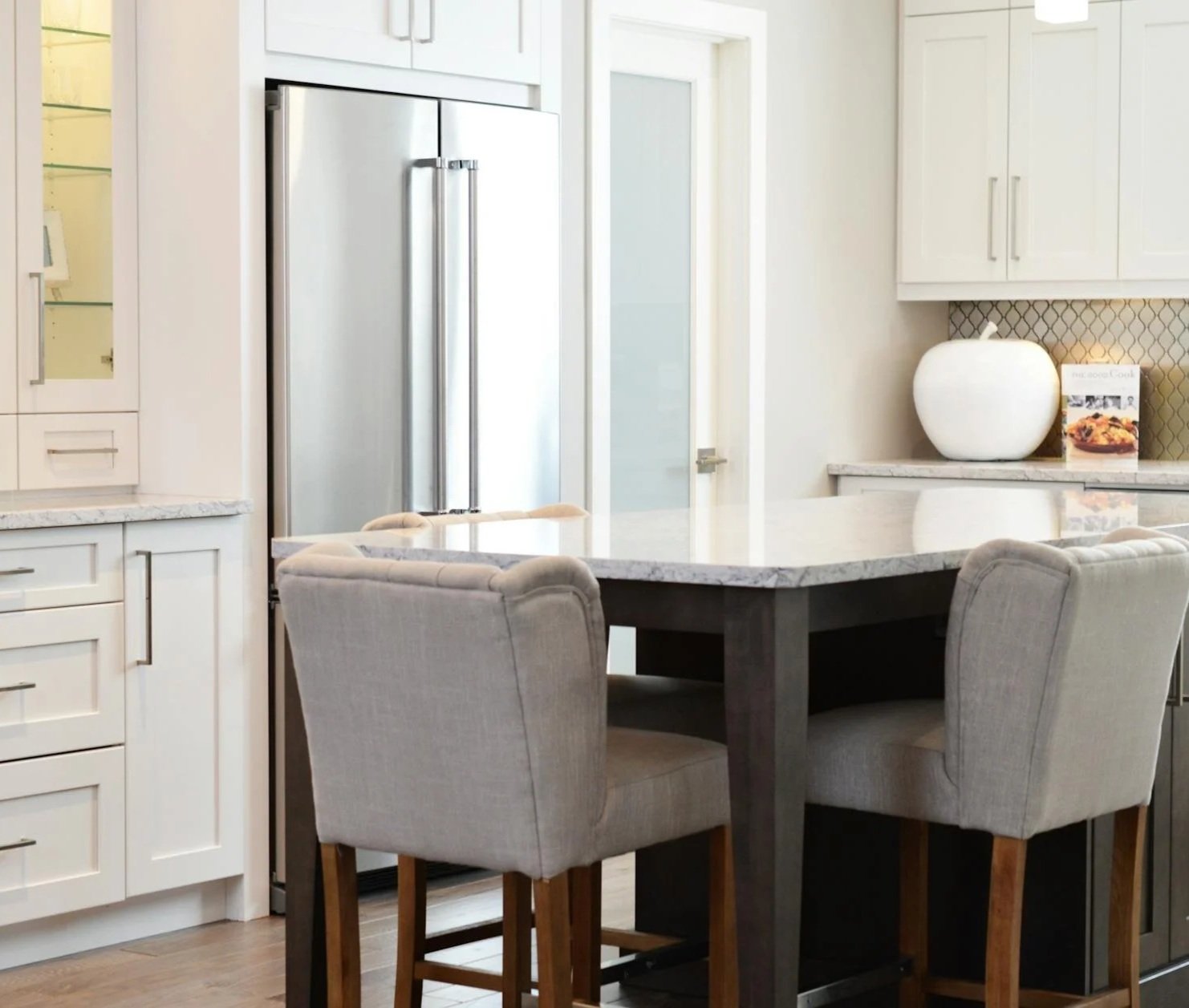 Task-Smart serviced stainless steel refrigerator in Davenport Florida.