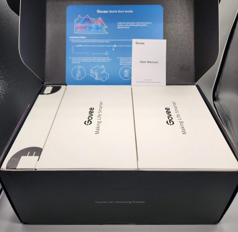 Task-Smart opening box with Govee smart home products, including user manual and quick start guide, labeled "Making Life Smarter." In Haines City, FL