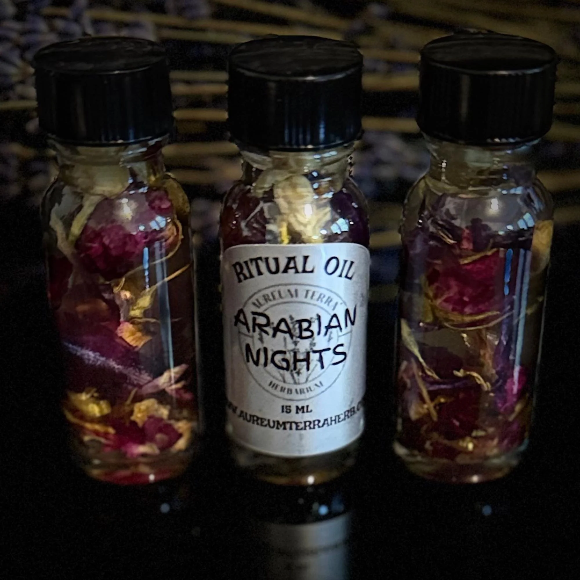 15ml bottle of Arabian Nights Ritual Intention Oil by Aureum Terra Herbarium for magnetic charm and social allure