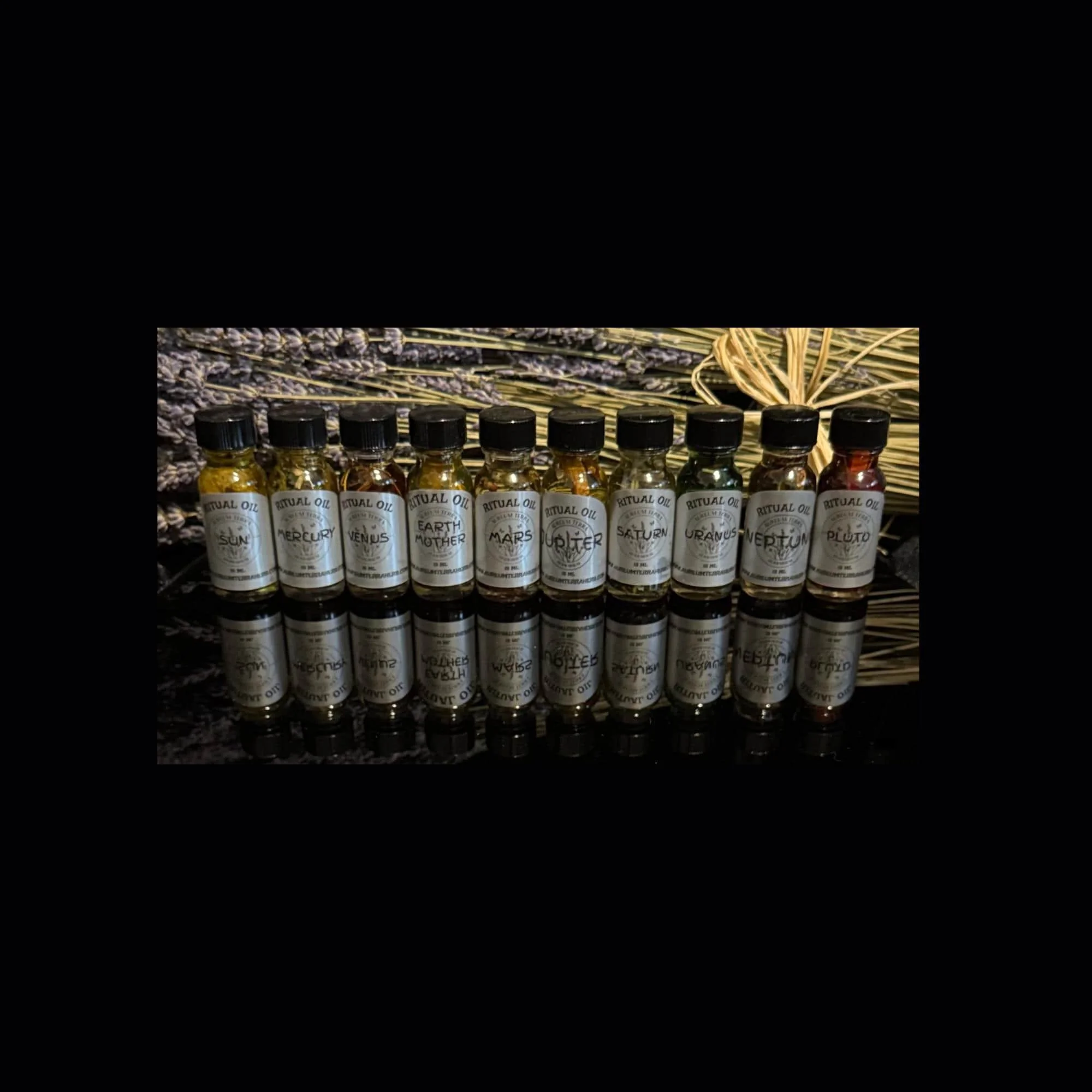 Expanded planetary ritual oil collection by Aureum Terra Herbarium aligned with celestial and elemental forces