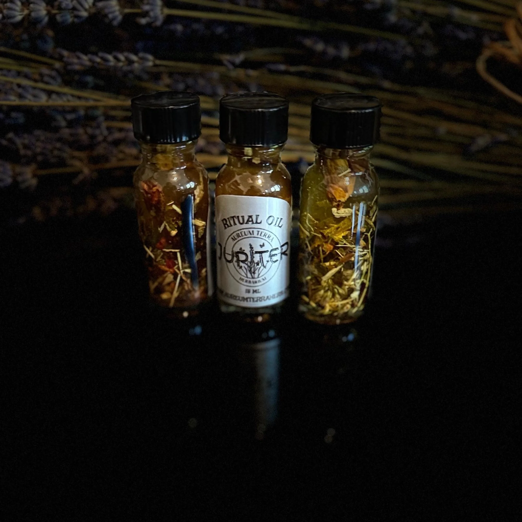 Jupiter Ritual Intention Herbarium Oil with botanicals for prosperity, wisdom, and expansion