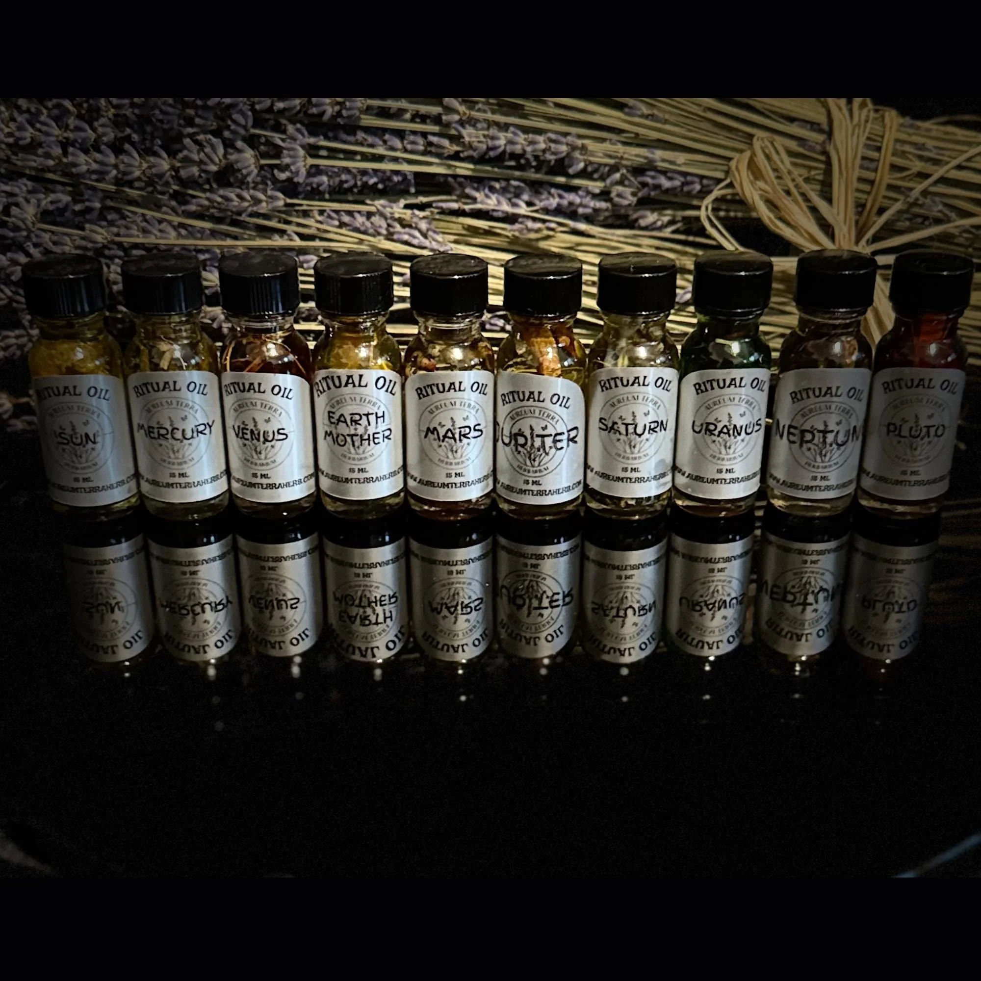 Expanded planetary ritual oil collection by Aureum Terra Herbarium aligned with celestial and elemental forces