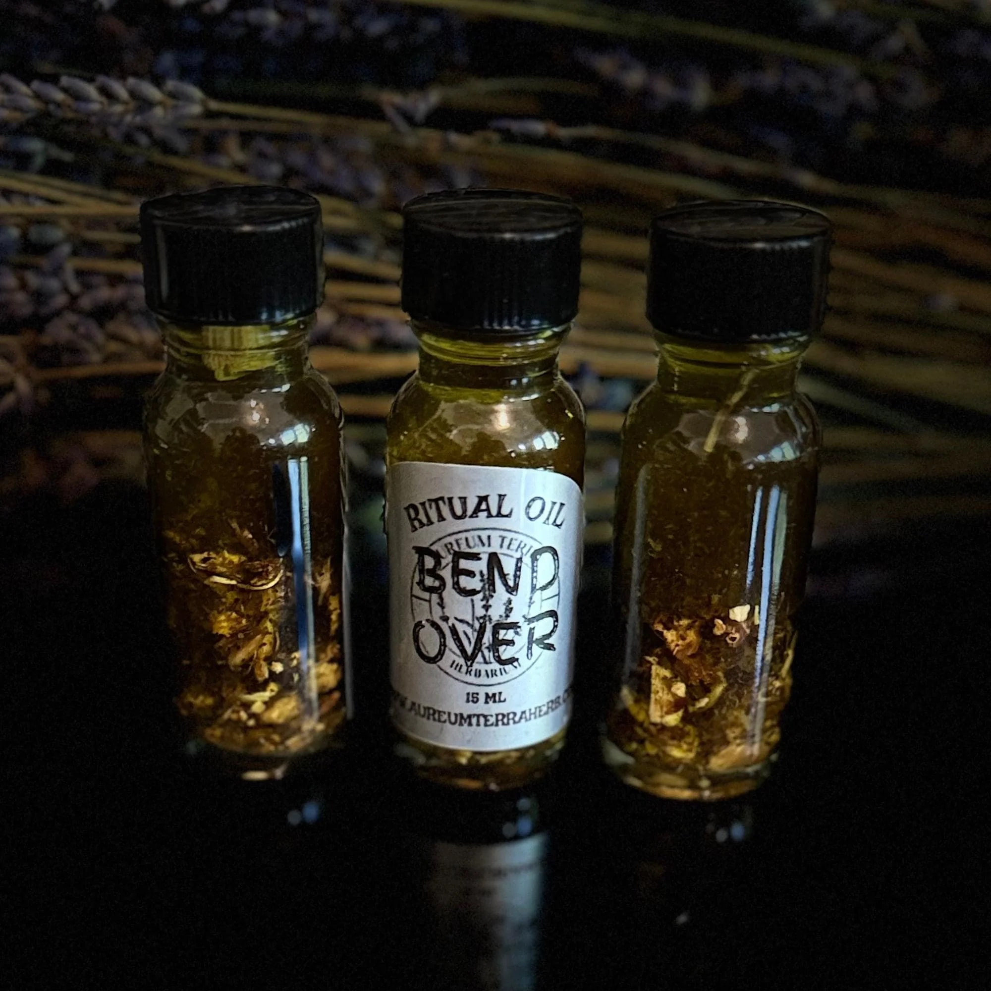 15ml bottle of Bend Over Ritual Intention Oil by Aureum Terra Herbarium for command and influence work