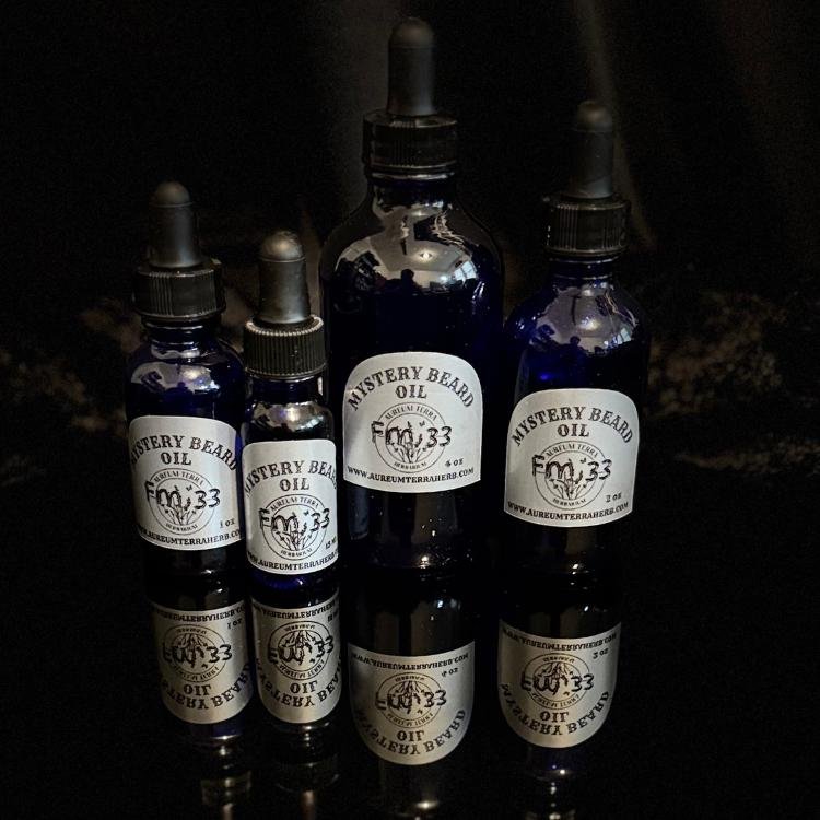 Mystery Beard Oil Formula 33 by Aureum Terra Herb with coriander, ginger lily, and ylang ylang in refillable glass bottle