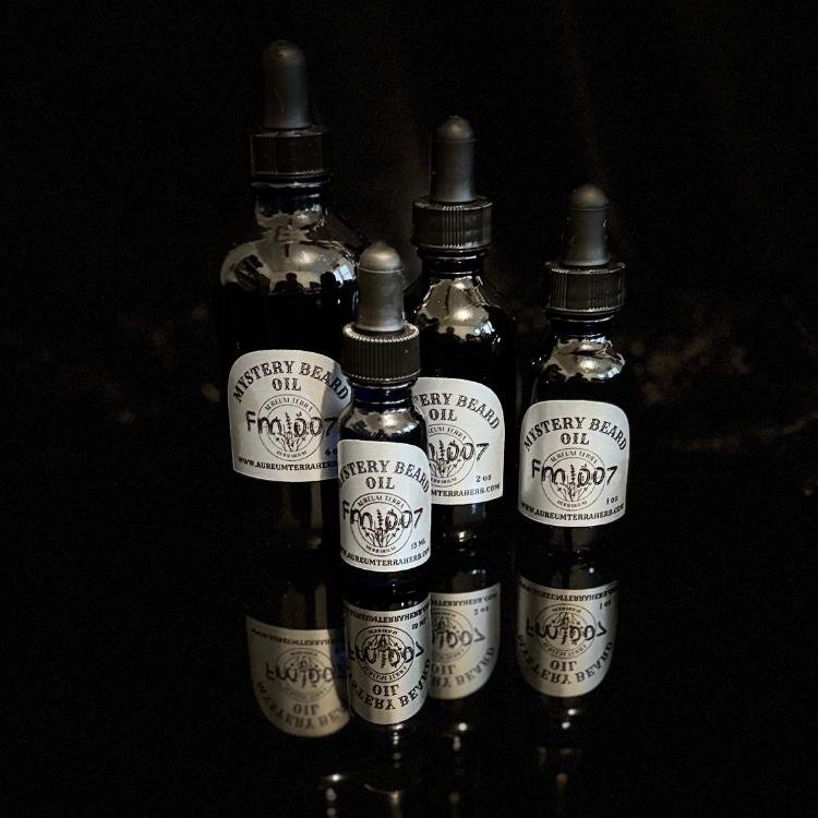 Mystery Beard Oil Formula 007 by Aureum Terra Herb with sweet orange, cardamom, and tobacco oud in refillable glass bottle