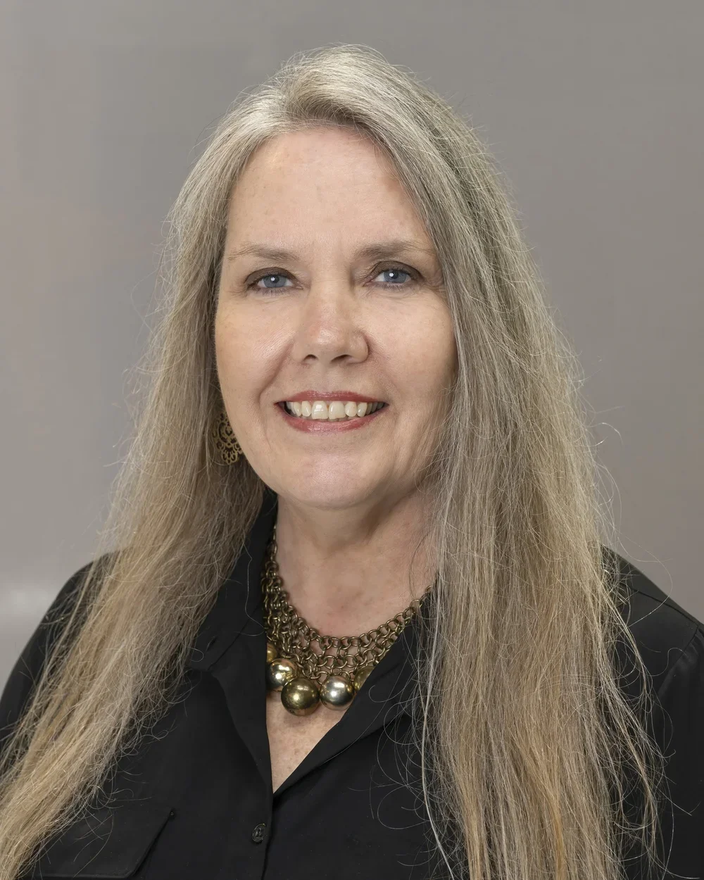 Kimberly Moussa, Interior Designer at Seville Home — professional portrait in neutral tones