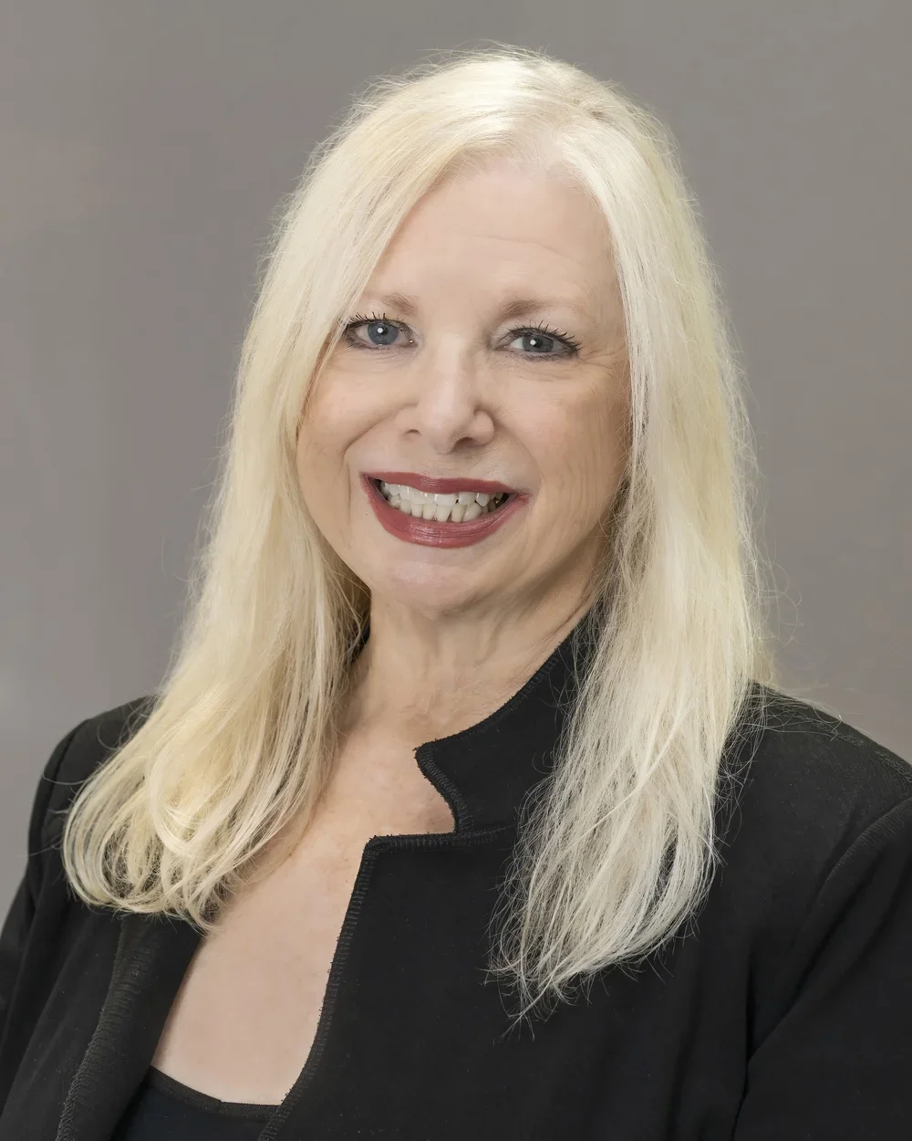 Karen Conover, Interior Designer at Seville Home — professional portrait in neutral tones