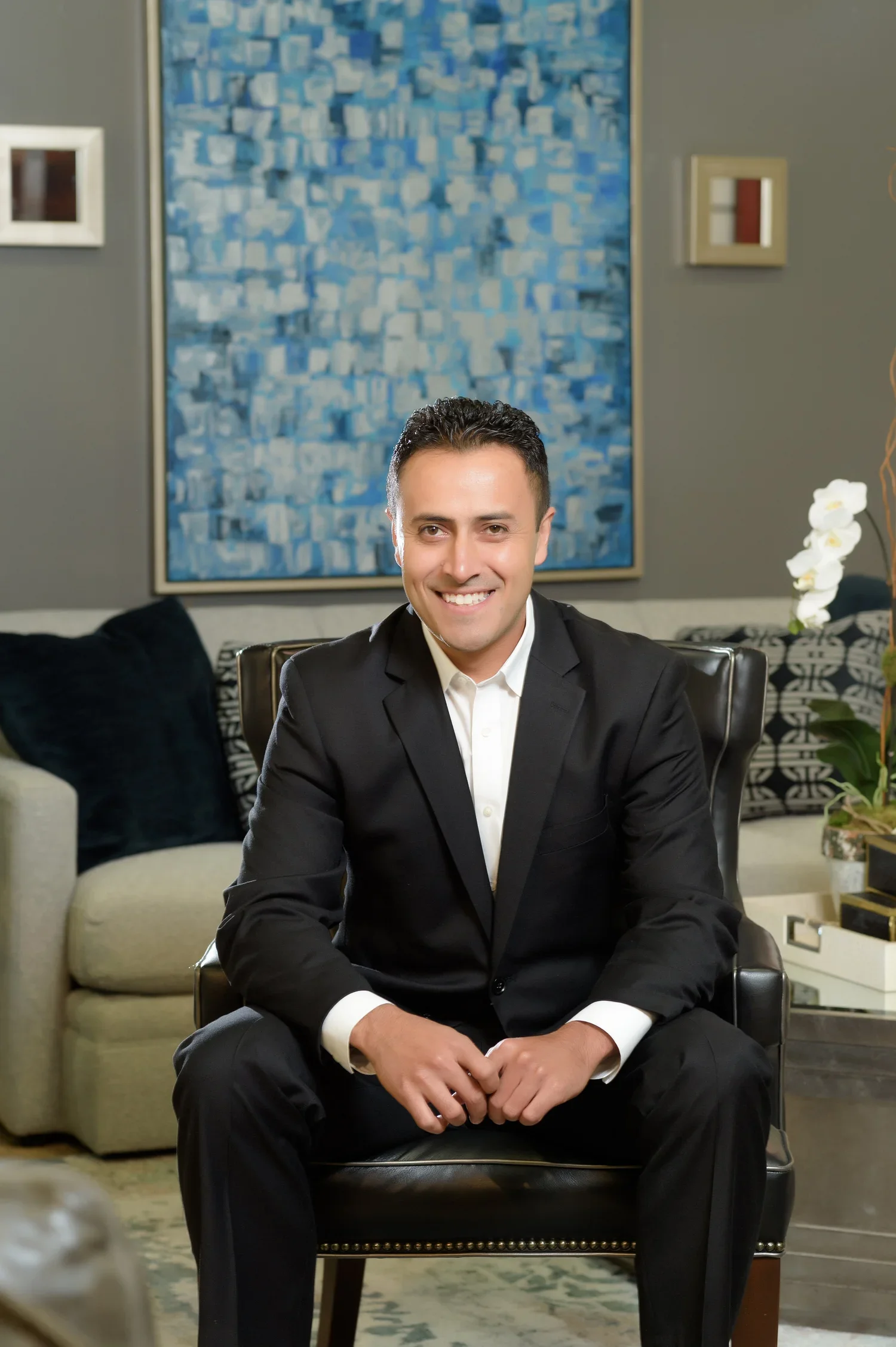 Gil Urenda, VP of Services at Seville Home — professional portrait with warm smile