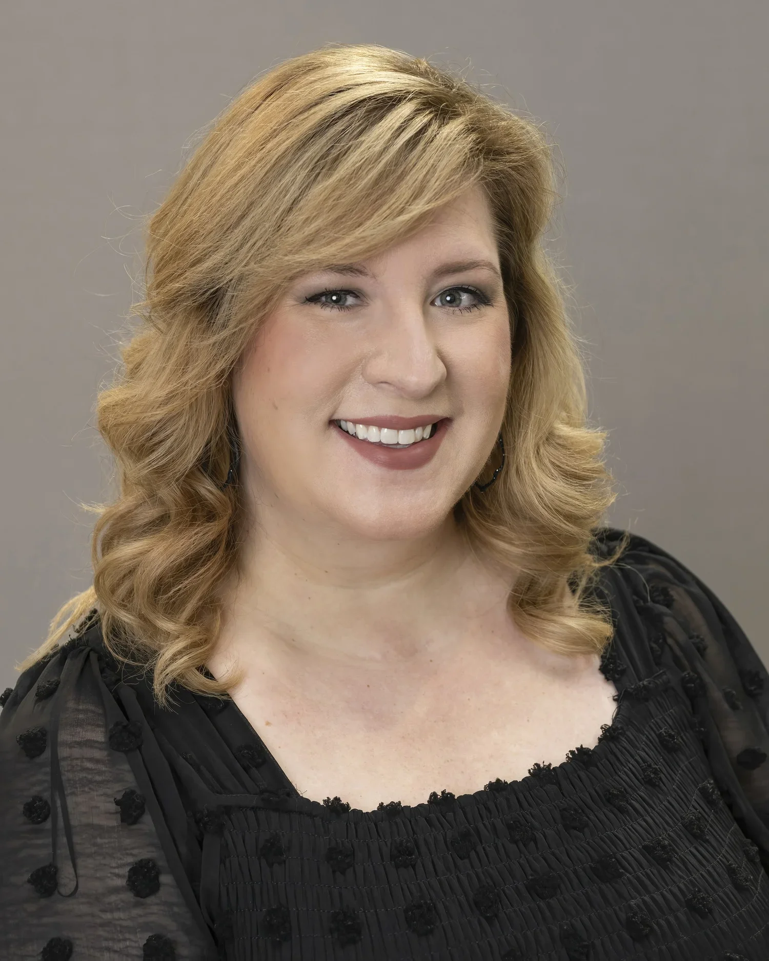 Meredith Peterson, Interior Designer at Seville Home — professional portrait in neutral tones