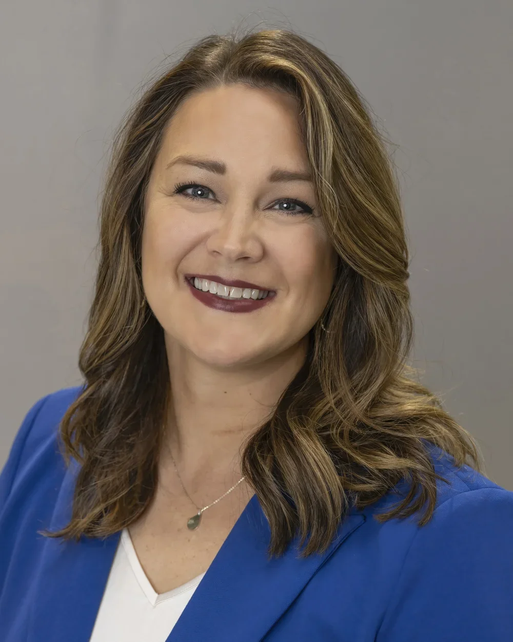 Carrie McColgan, Interior Designer and Floor Manager at Seville Home — professional portrait in neutral tones