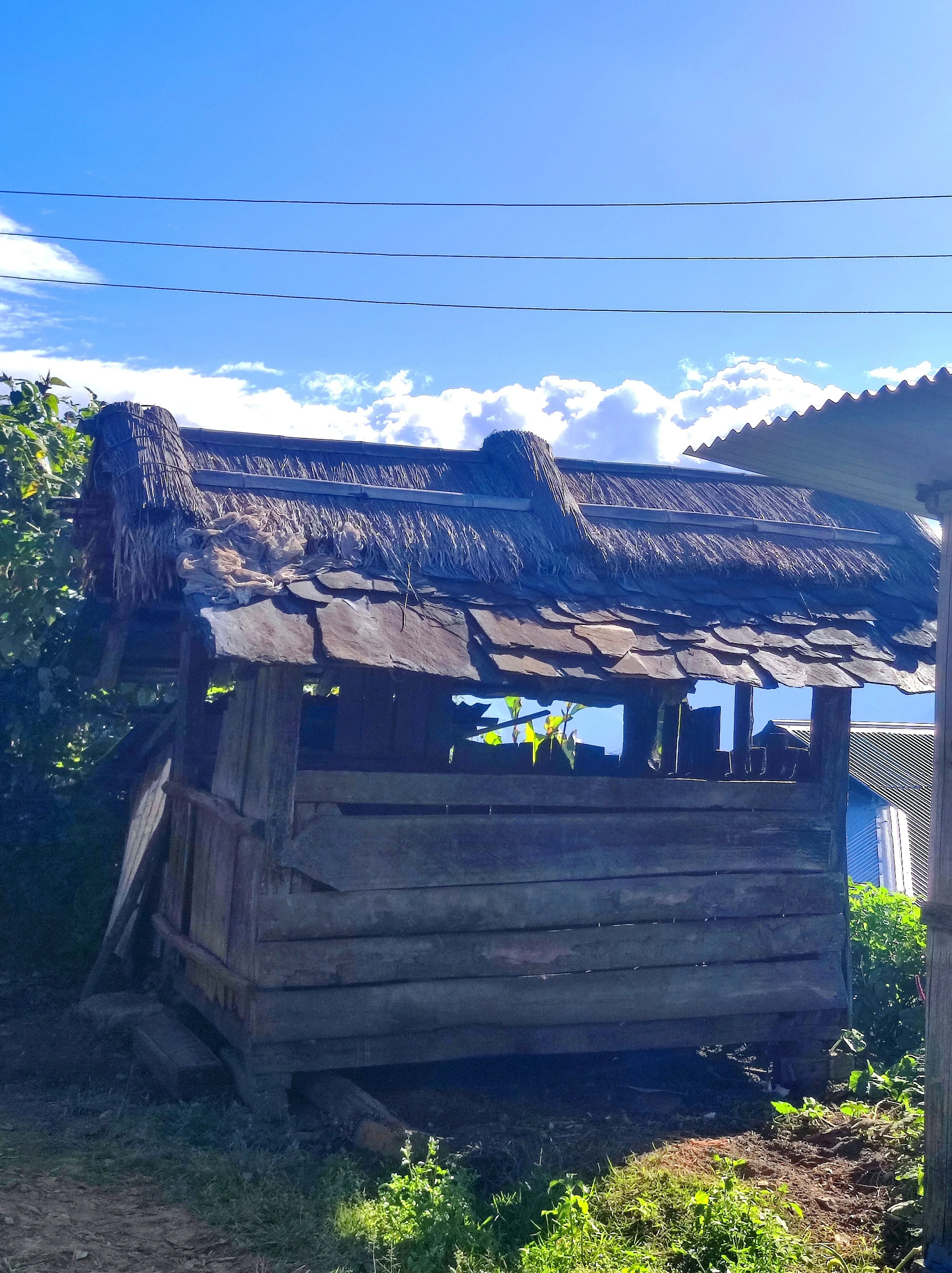 The roofs of pig houses are constructed using slate.