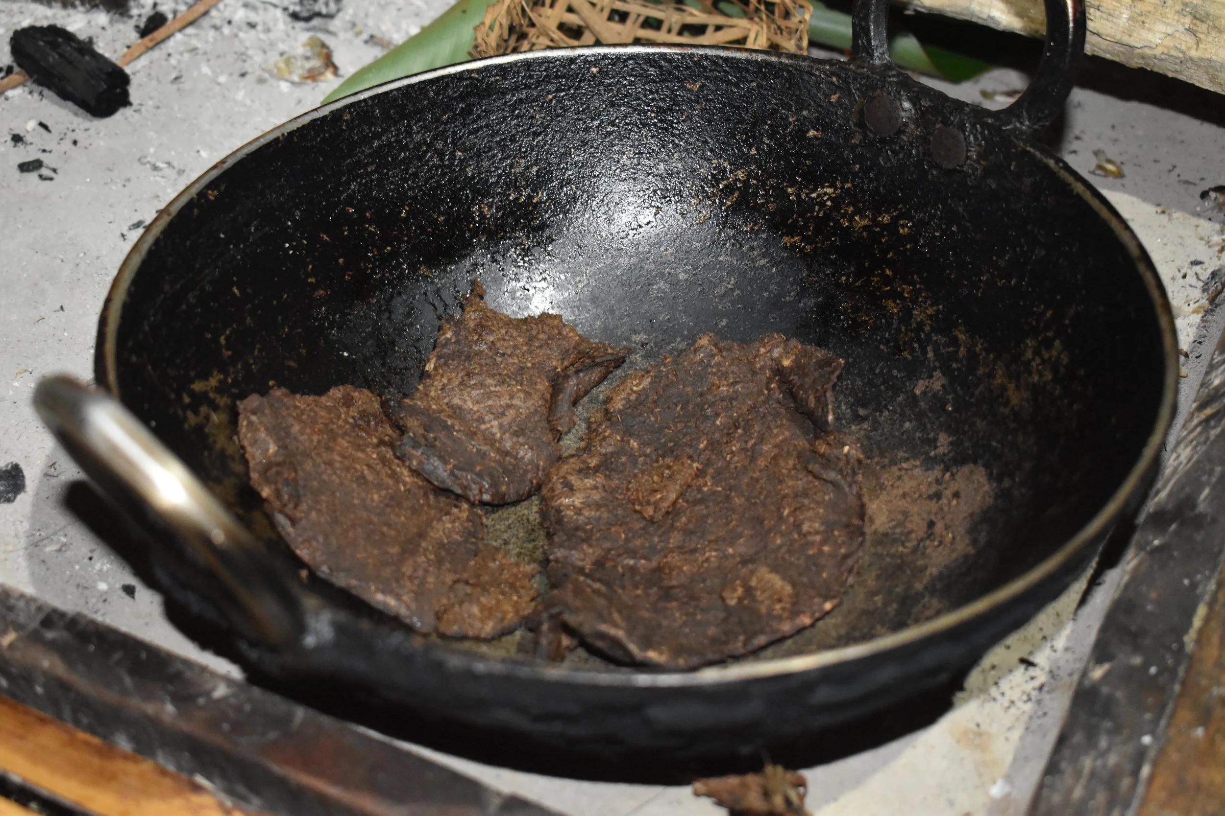 How the Atheeh Naphu (fermented fern tree chapati) looks after being fried without oil or any added ingredients.
