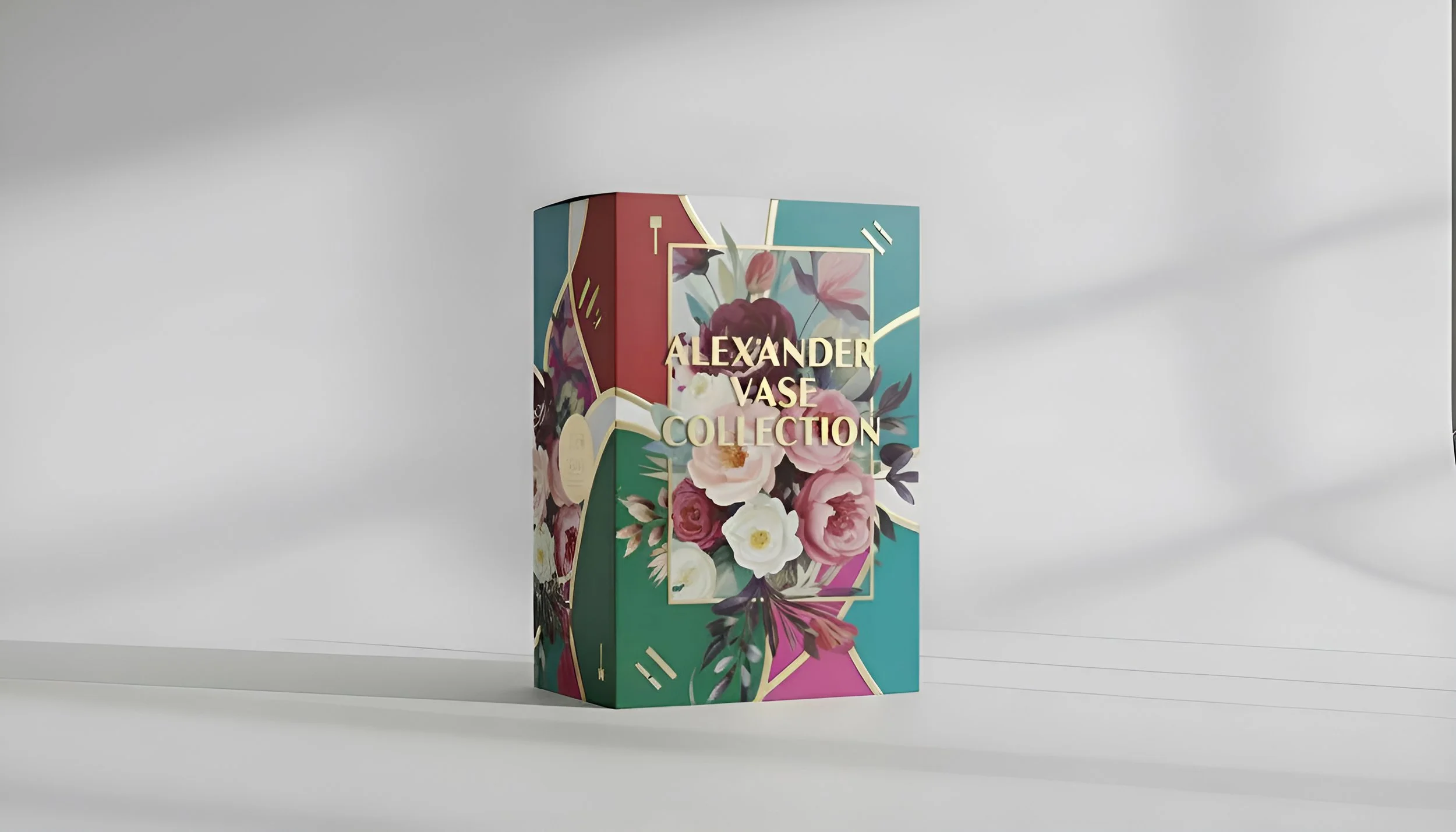 A colorful box with floral design, labeled "Alexander Vase Collection" on a white surface against a light grey background.