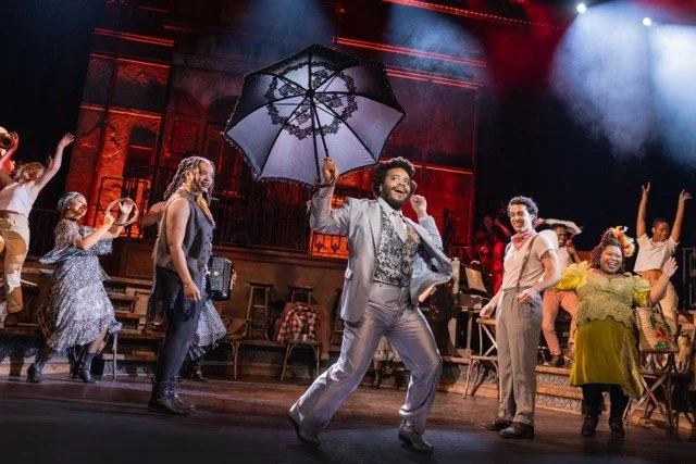 Rudy Foster (Hermes) and the Hadestown North American Touring Company, 2026.
Photo by: Evan Zimmerman for MurphyMade