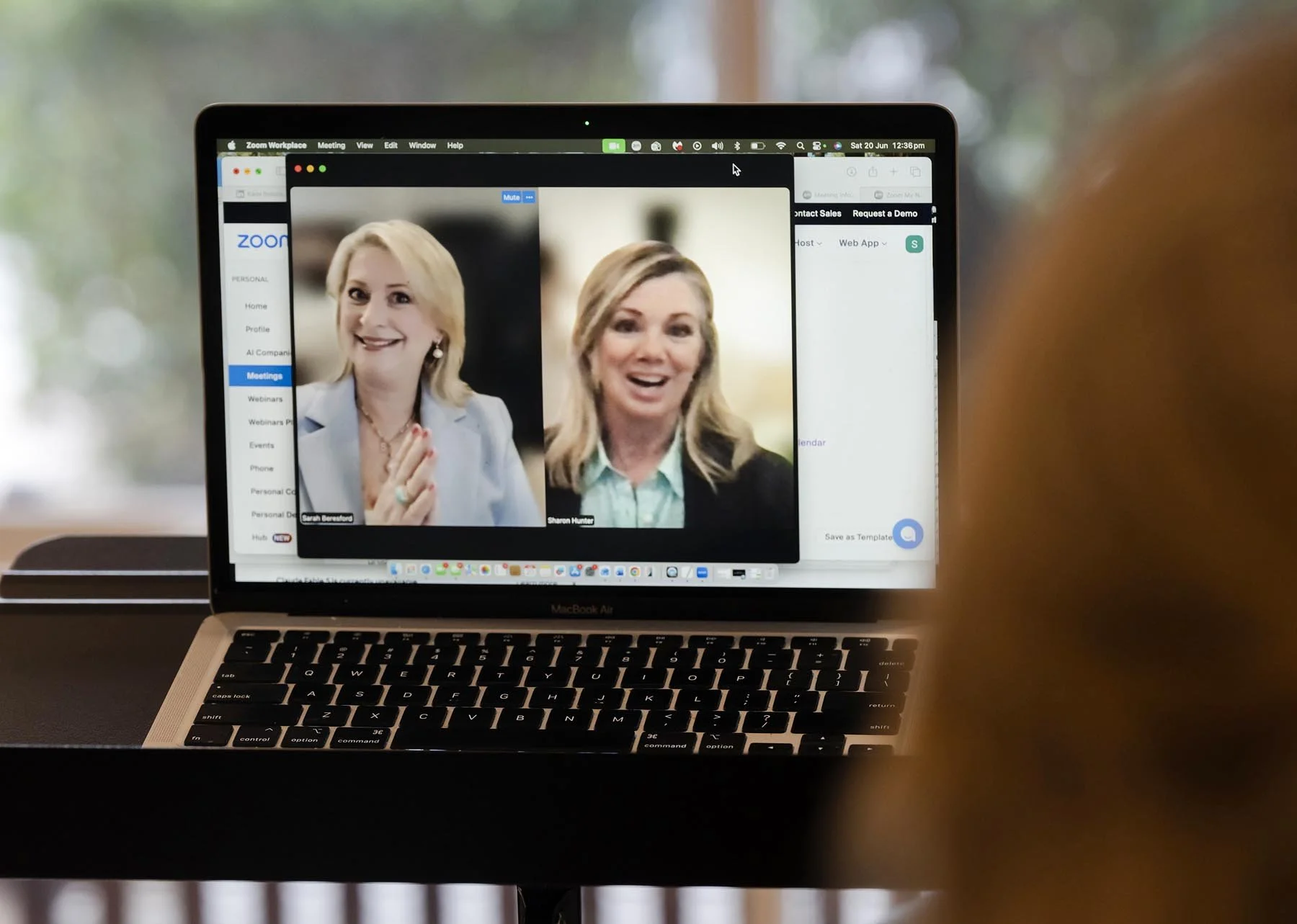 Laptop displaying an online coaching session with Sharon Hunter and a client during a virtual voice coaching consultation.
