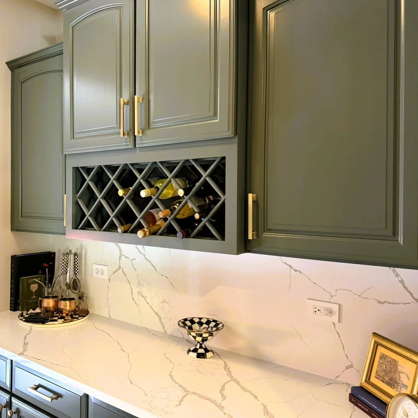 Third Street Interiors (Elmhurst-based interior design firm) featured interior design project of a kitchen refresh in Naperville, IL with painted cabinets, new hardware and light fixtures.