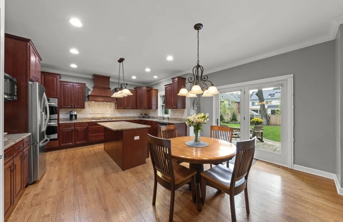 Third Street Interiors (Elmhurst-based interior design firm) featured interior design project of a kitchen refresh in Naperville, IL with painted cabinets, new hardware and light fixtures.