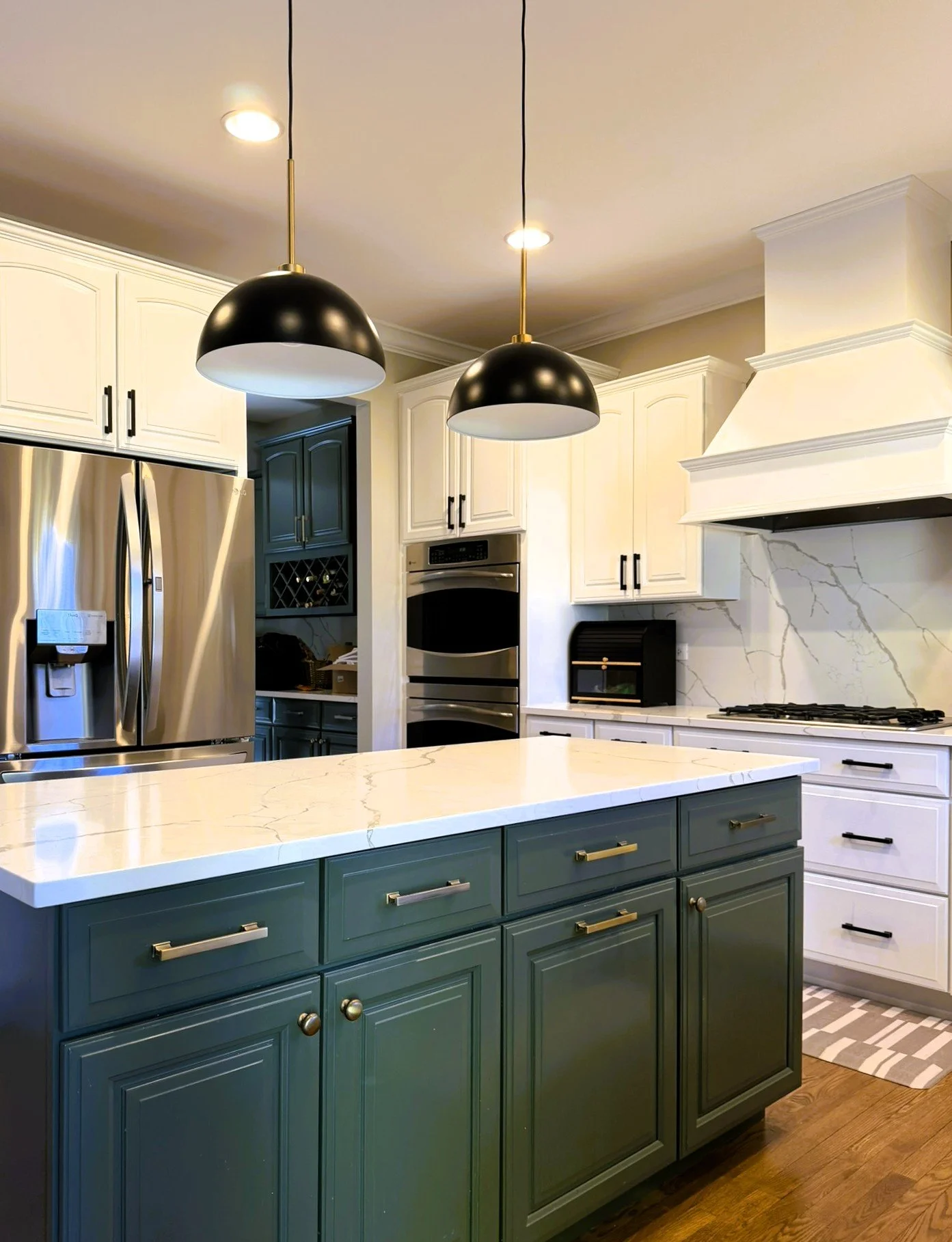 Third Street Interiors (Elmhurst-based interior design firm) featured interior design project of a kitchen refresh in Naperville, IL with painted cabinets, new hardware and light fixtures.