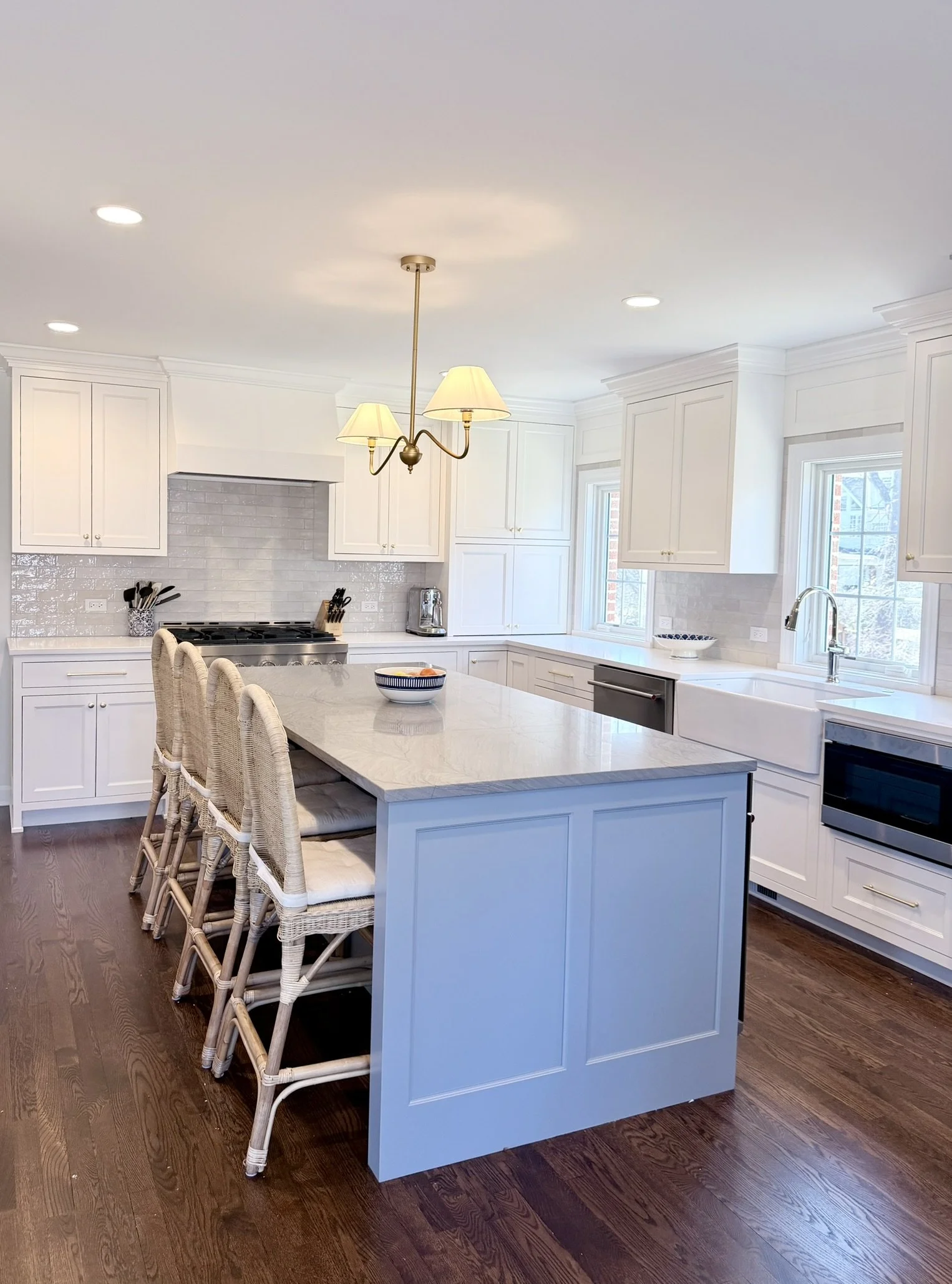 Third Street Interiors (Elmhurst-based interior design firm) featured interior design project of a kitchen remodel in Northfield, IL with gorgeous custom cabinets, contrasting countertops, and fireplace built-ins.