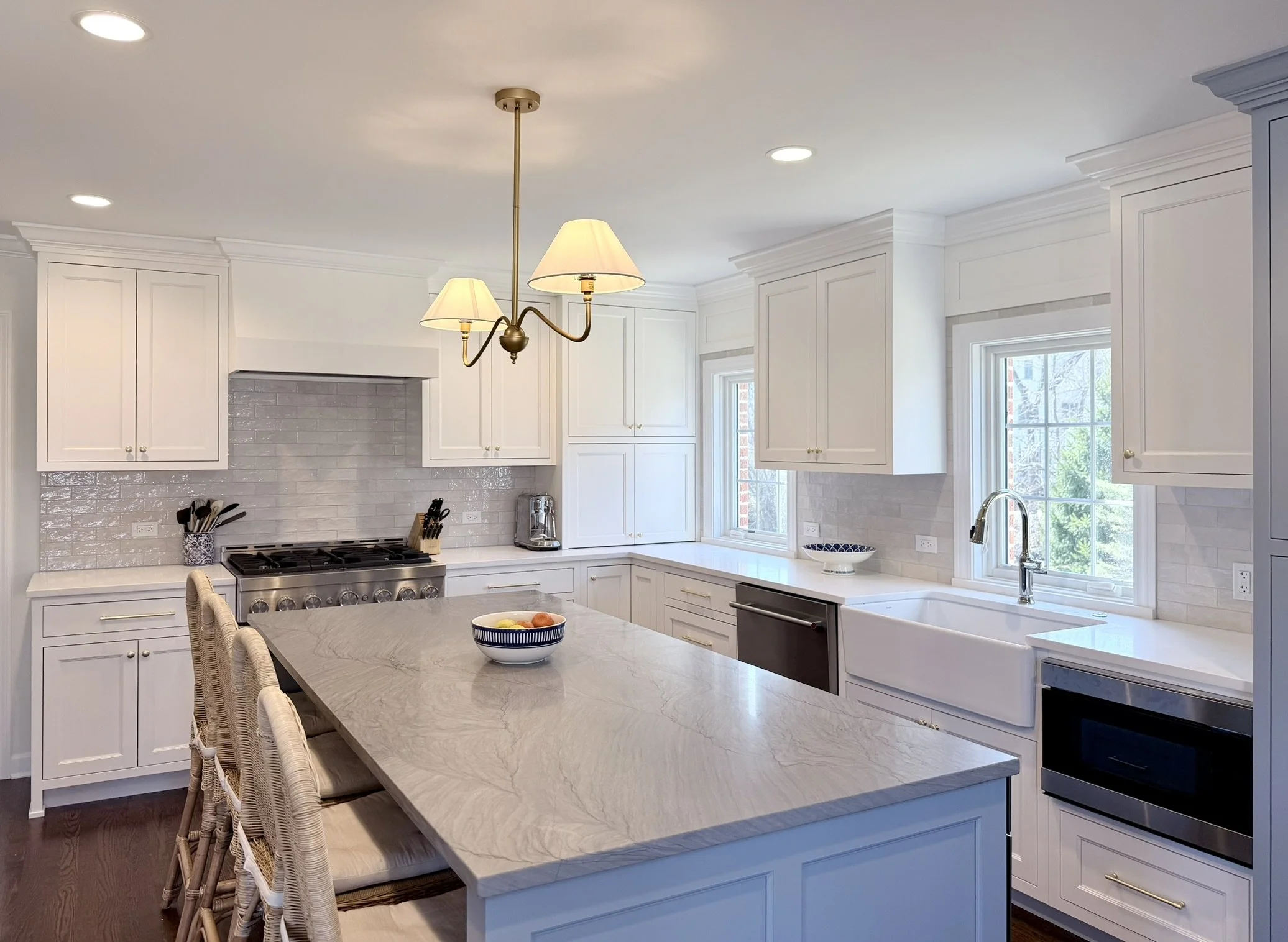 Third Street Interiors (Elmhurst-based interior design firm) featured interior design project of a kitchen remodel in Northfield, IL with gorgeous custom cabinets, contrasting countertops, and fireplace built-ins.
