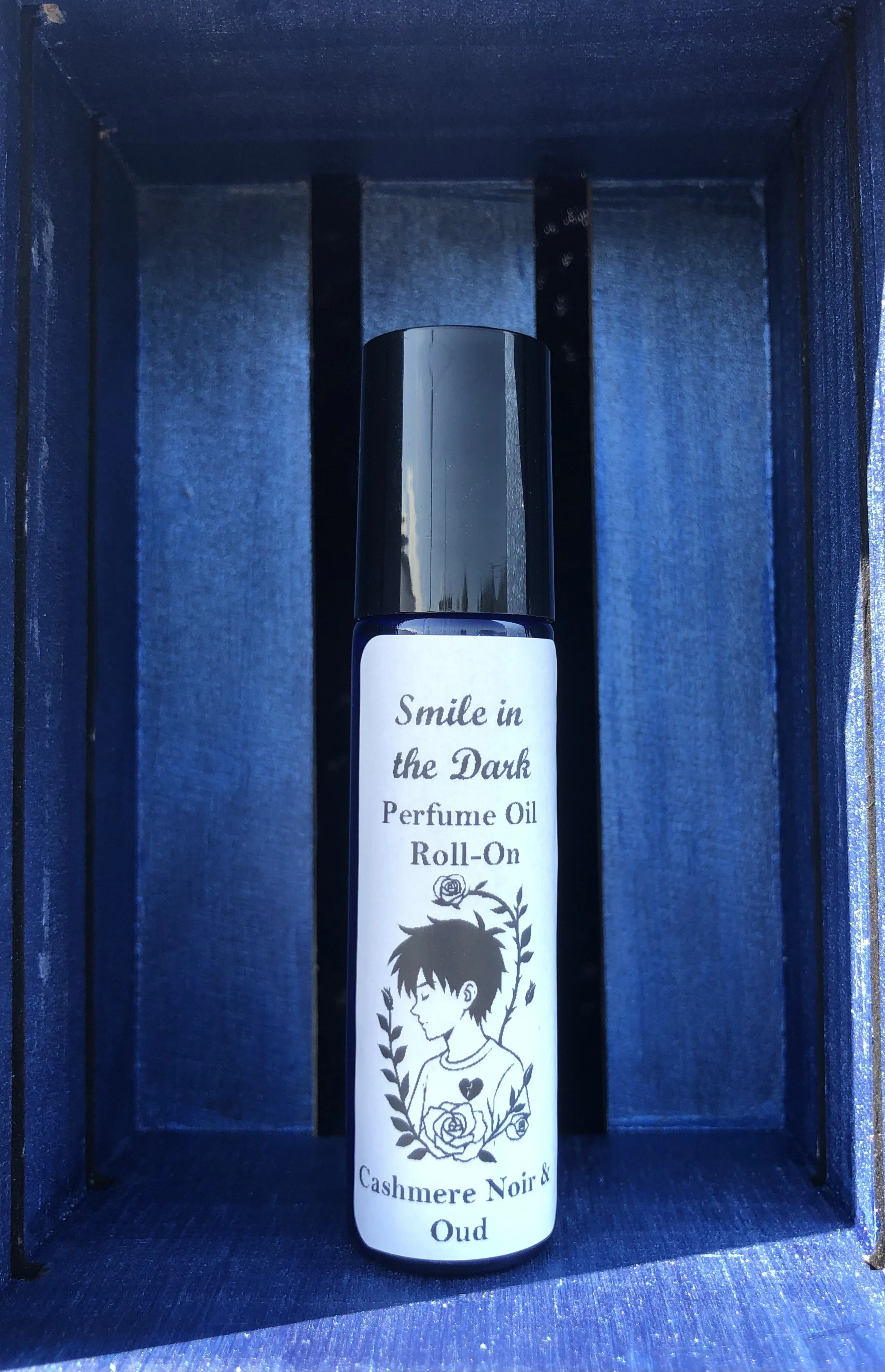 Serpant's Smile: Cashmere Noir & Oud Perfume Oil Roll-On
