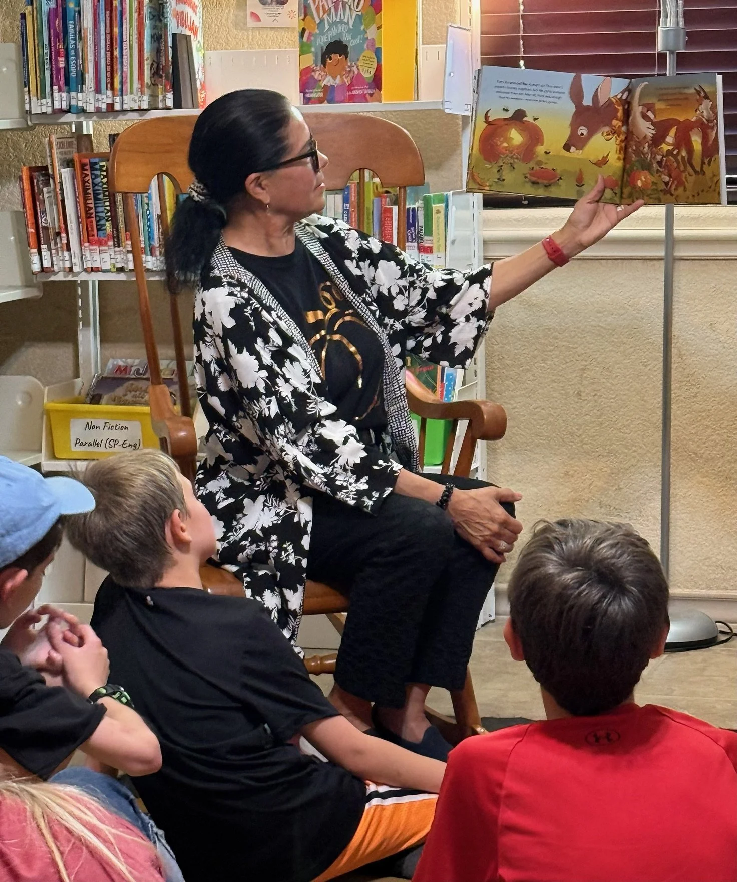 Author Gloria Reyes rading the Joyful Pumpkin at Jarrell Public Library