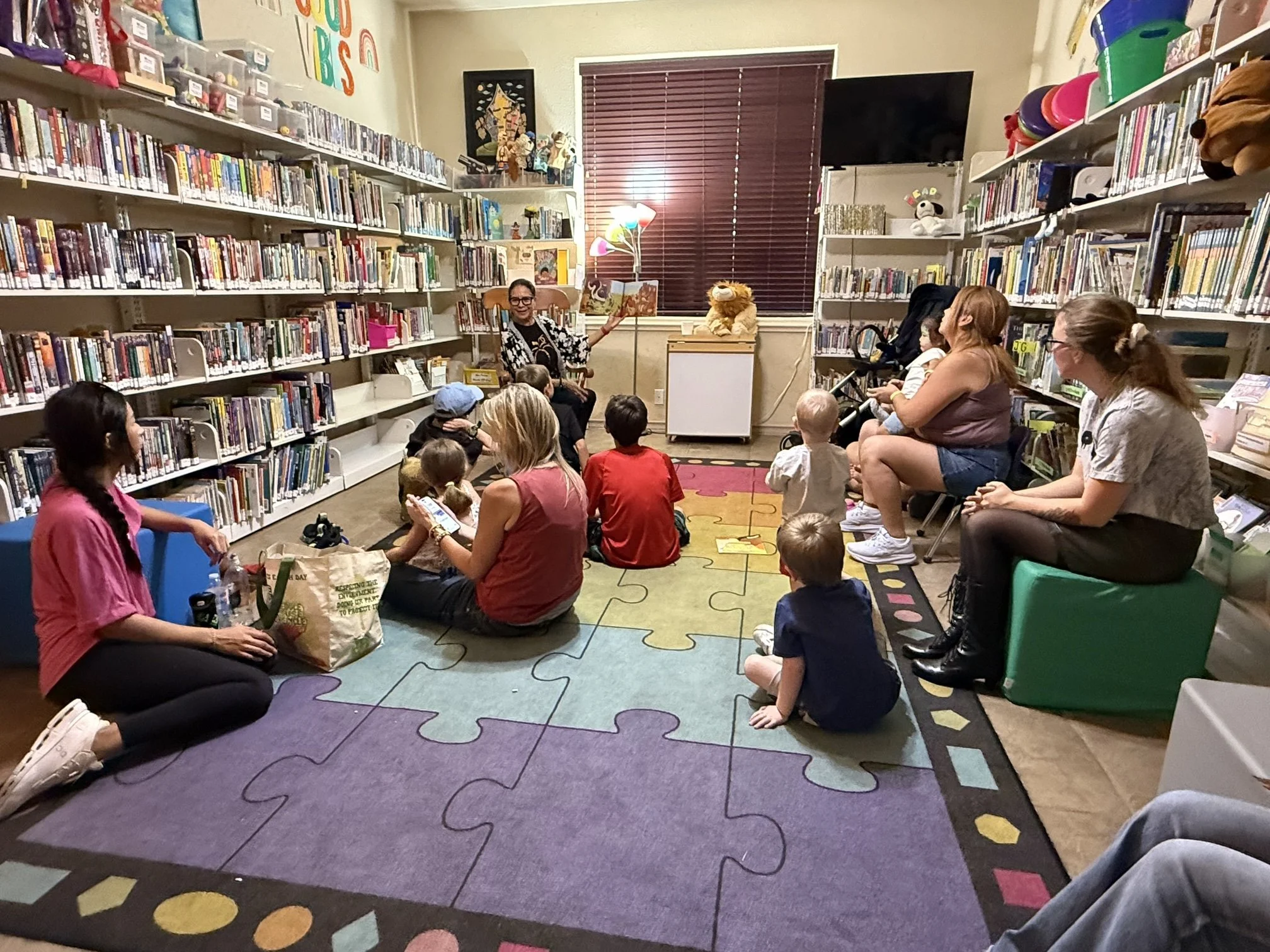Author Gloria Reyes reading her new book The Joyful Pumpkin at the Jarrell Public Library in Jarell Texas
