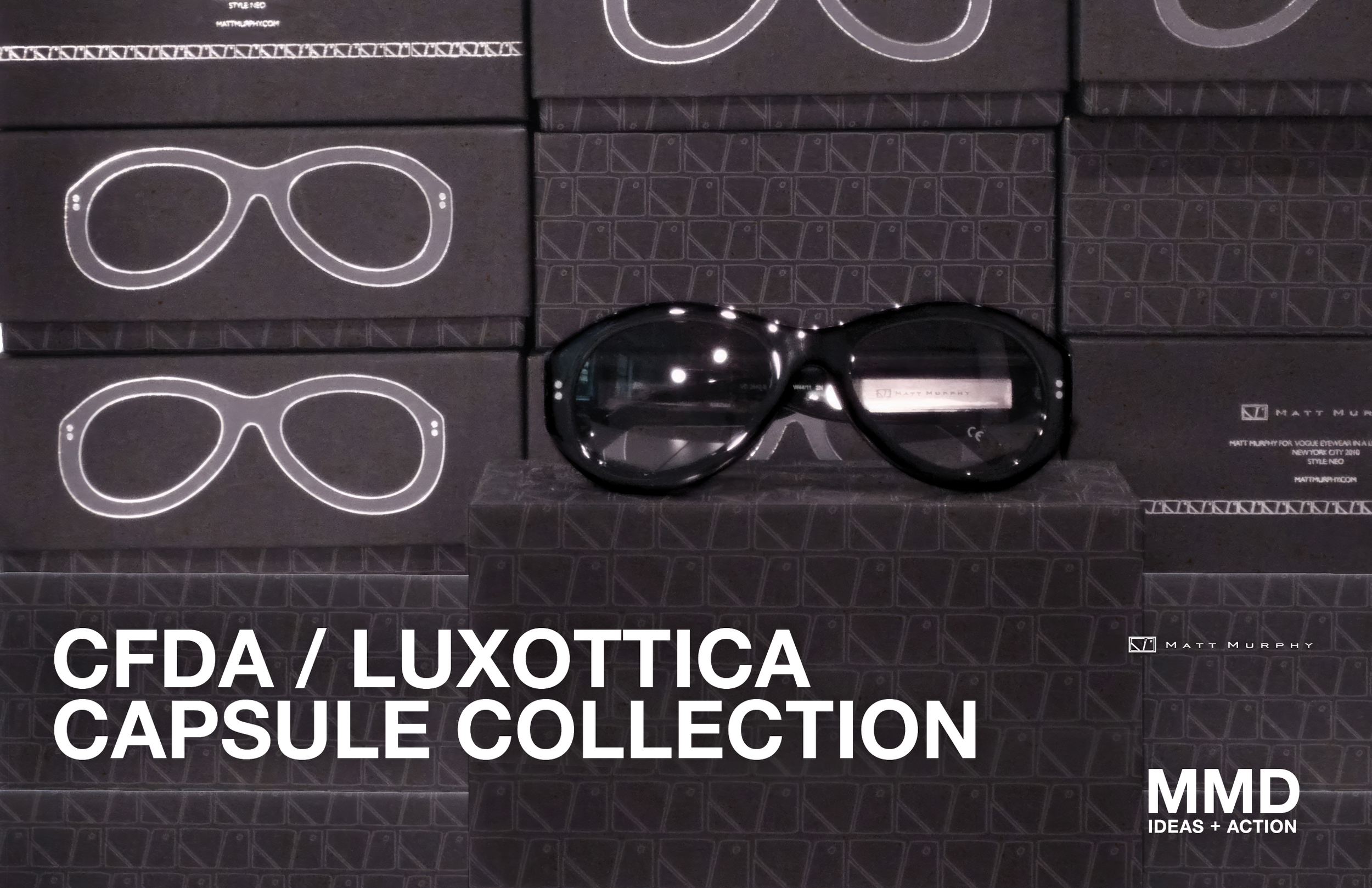 Black sunglasses displayed on top of black boxes featuring the Matt Murphy logo and outline of sunglasses in white.