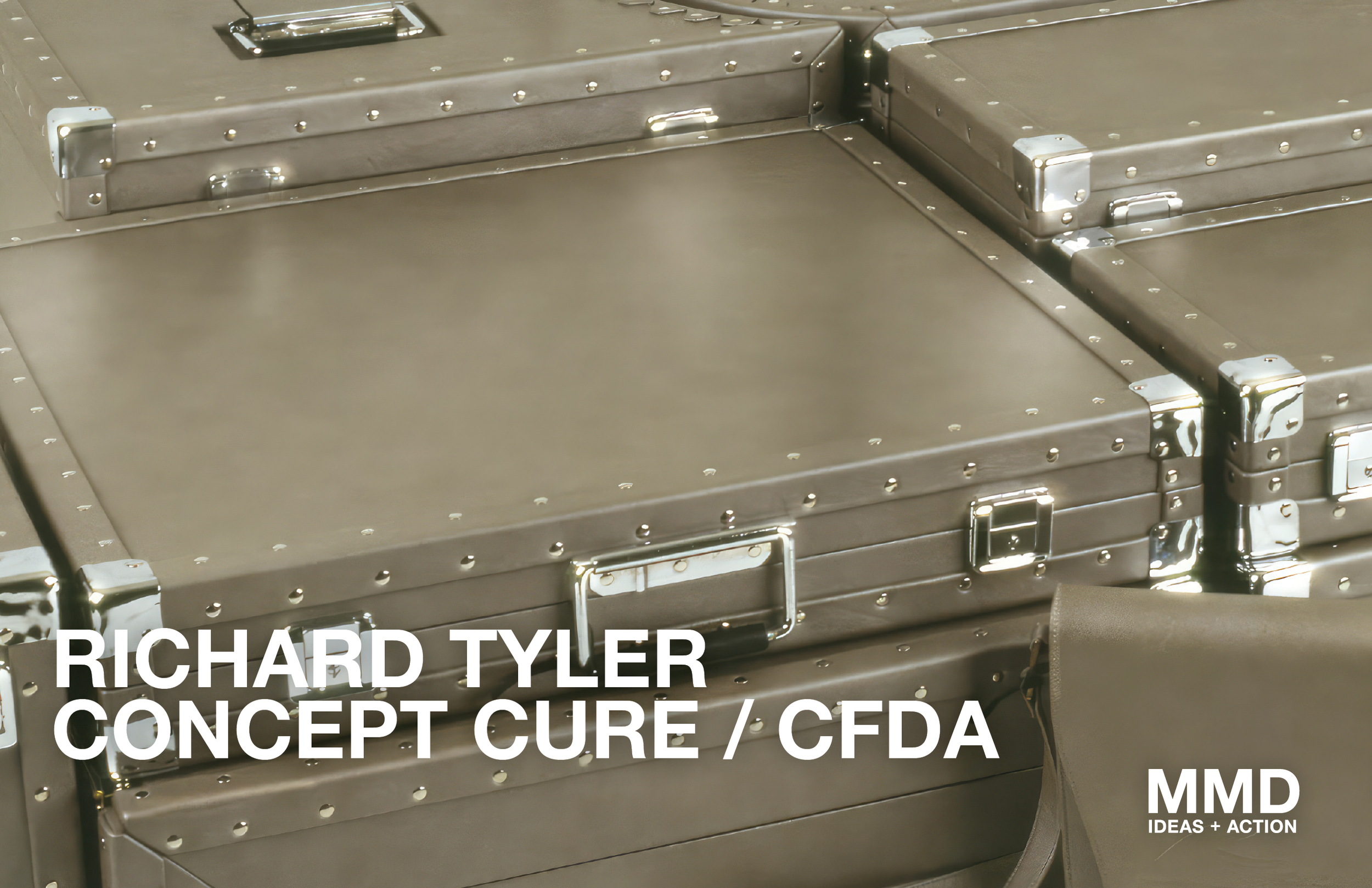 Stacked metal cases with rivets and handles, likely for storage or transportation.