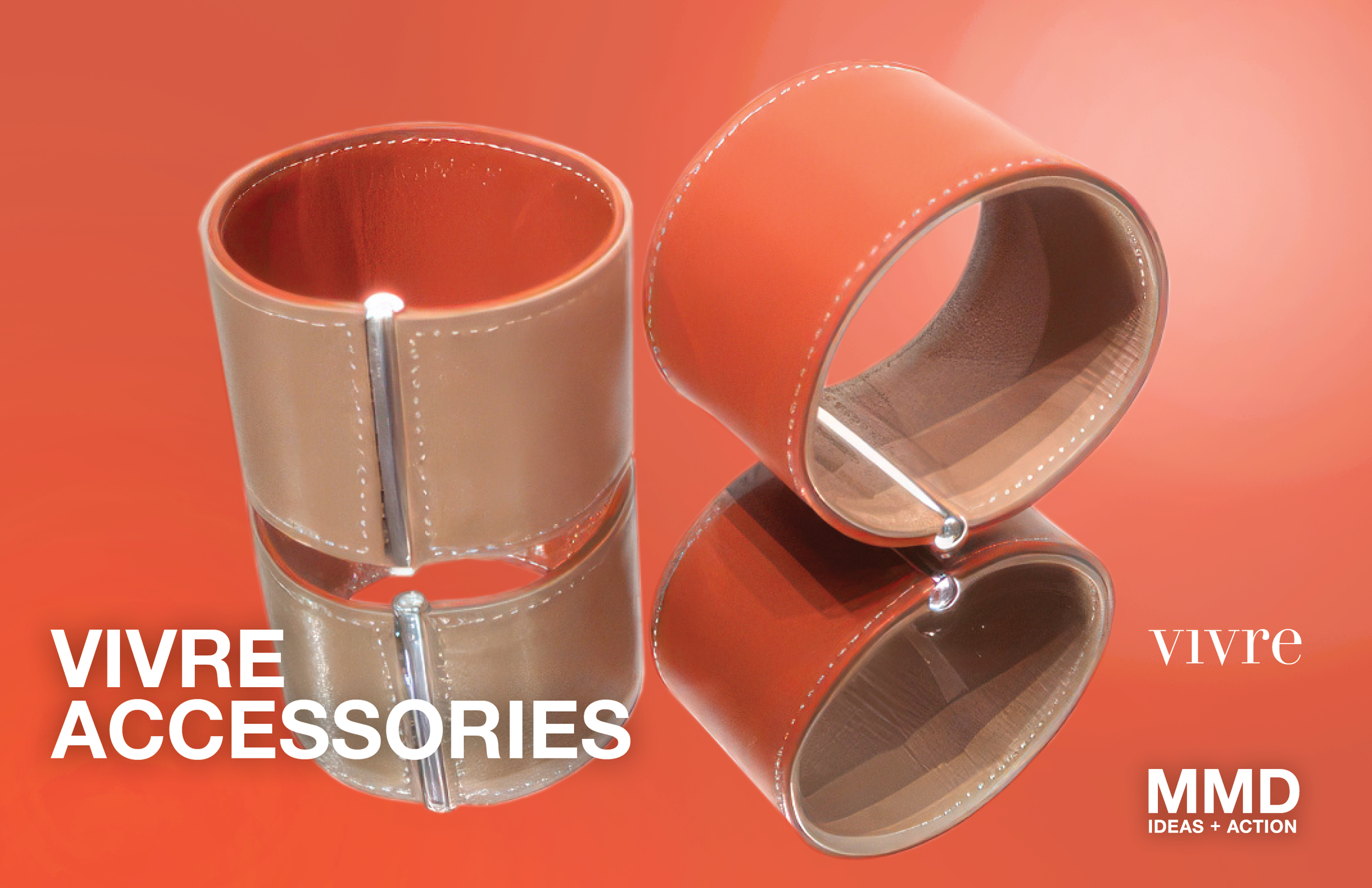 Two stylish orange and beige handbags with silver details, one open showing a brown interior, placed on a reflective orange surface. Bold white text reads "VIVRE ACCESSORIES" and smaller white text in the lower right corner says "VIVRE MMD IDEAS + AC