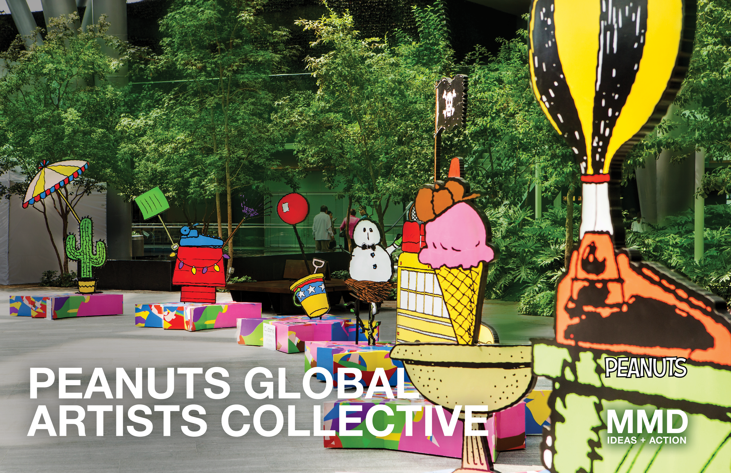 Colorful cartoon-style Peanuts characters and objects, including a cactus, umbrella, snowman, balloon, ice cream cone, and spray paint on display at the Peanuts Global Artists Collective event, with trees and a modern building in the background.
