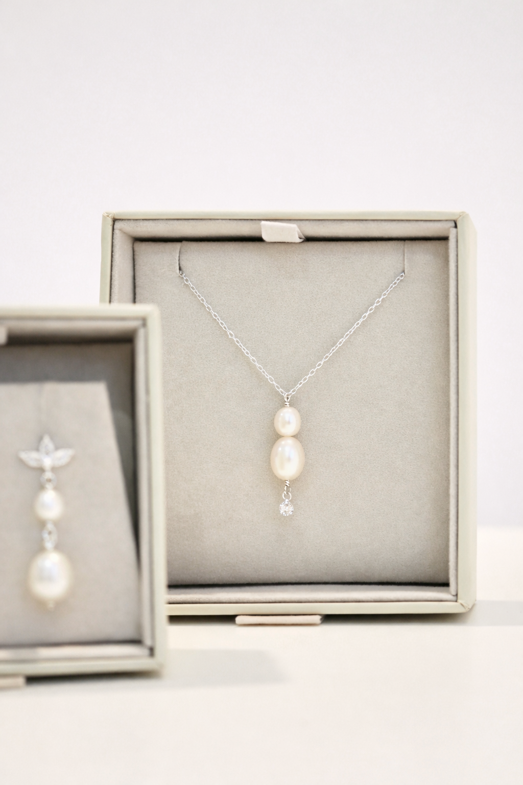 Double Delphine Necklace.png