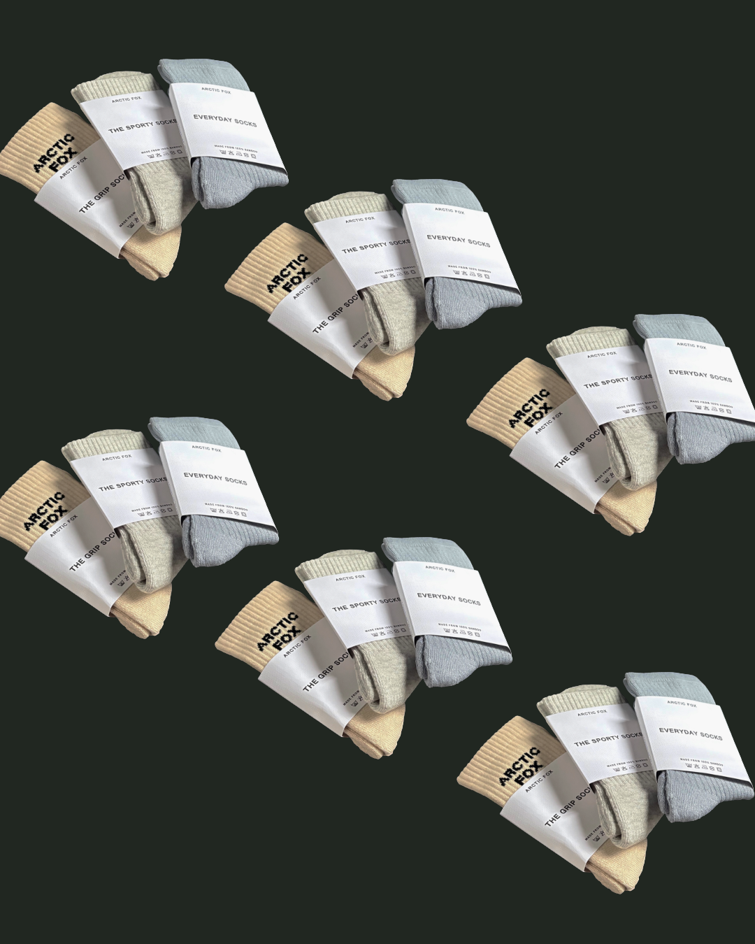 Scenic view of a lake surrounded by green hills and mountains under a cloudy sky.