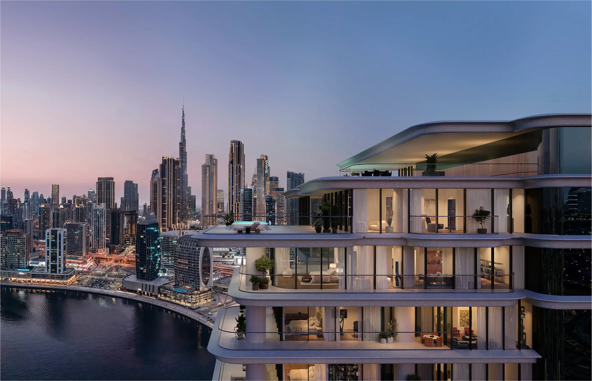 Modern multi-story apartment building with greenery on terraces during sunset.