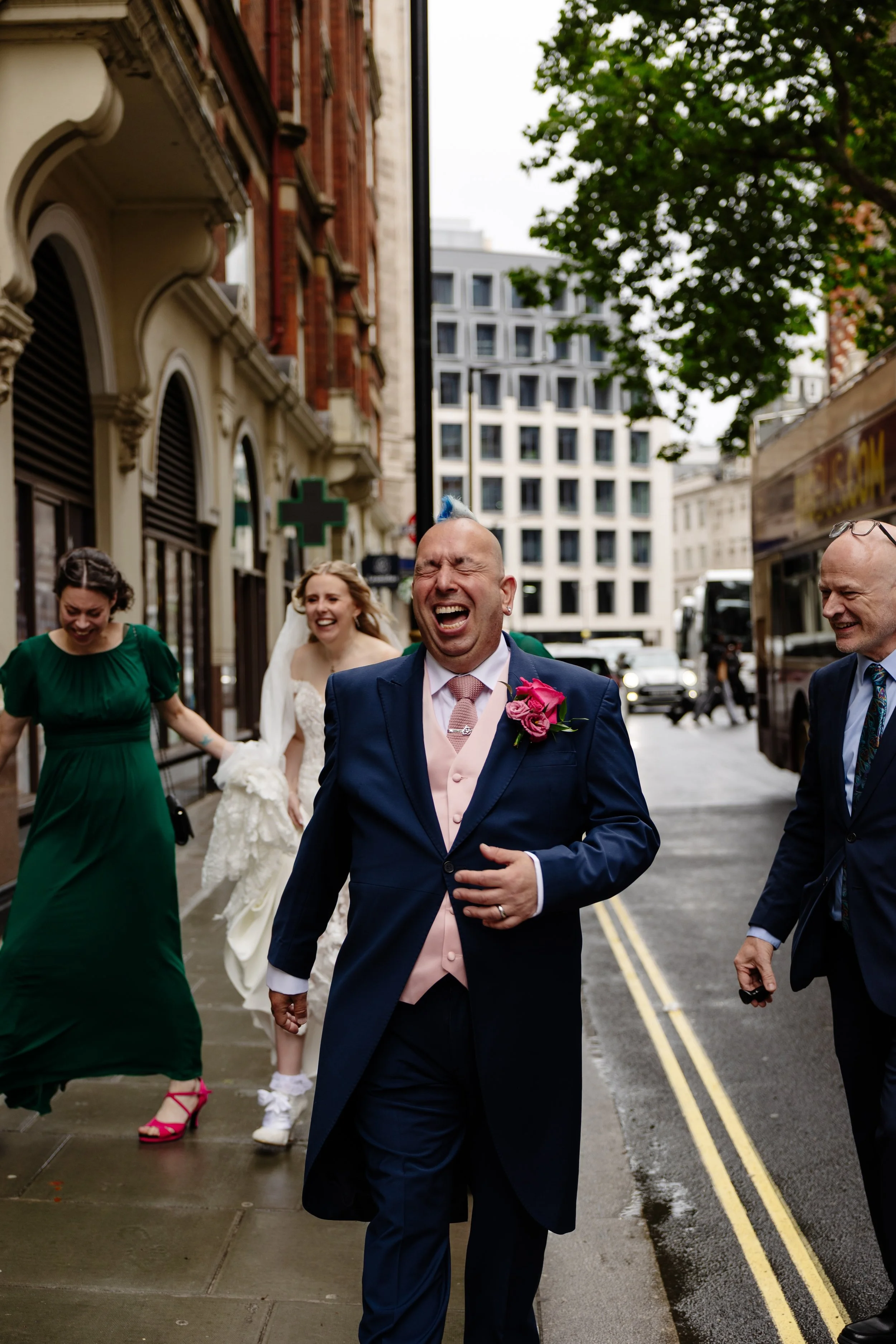 BurnTheScript-Mohawk-sporting-groom-laughs-walking-through-london-streets.JPG