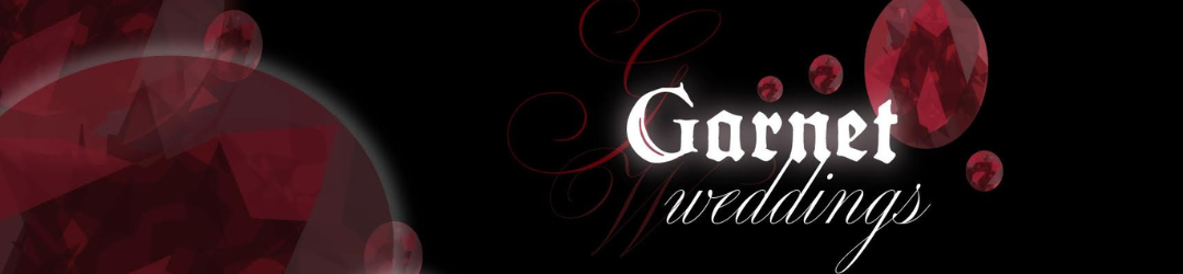 Garnet Weddings logo with red garnet gemstones and elegant black background.
