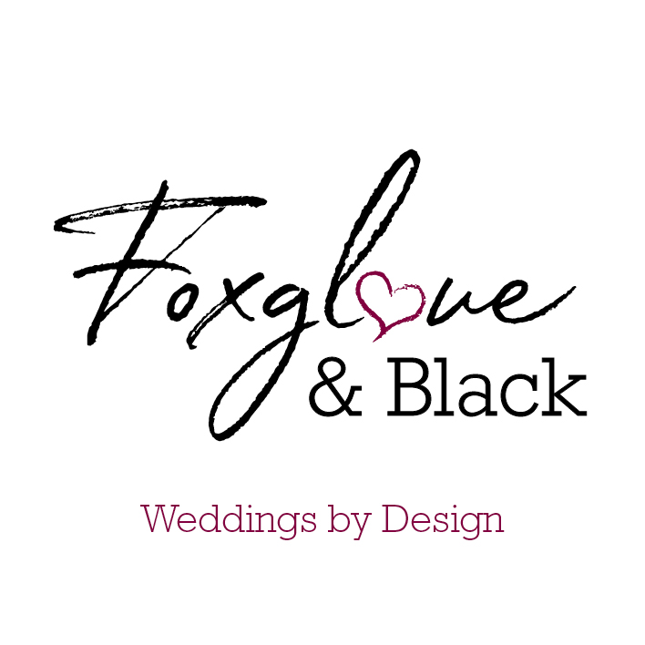 Logo for Foxglove & Black Weddings by Design with stylized text and a purple heart