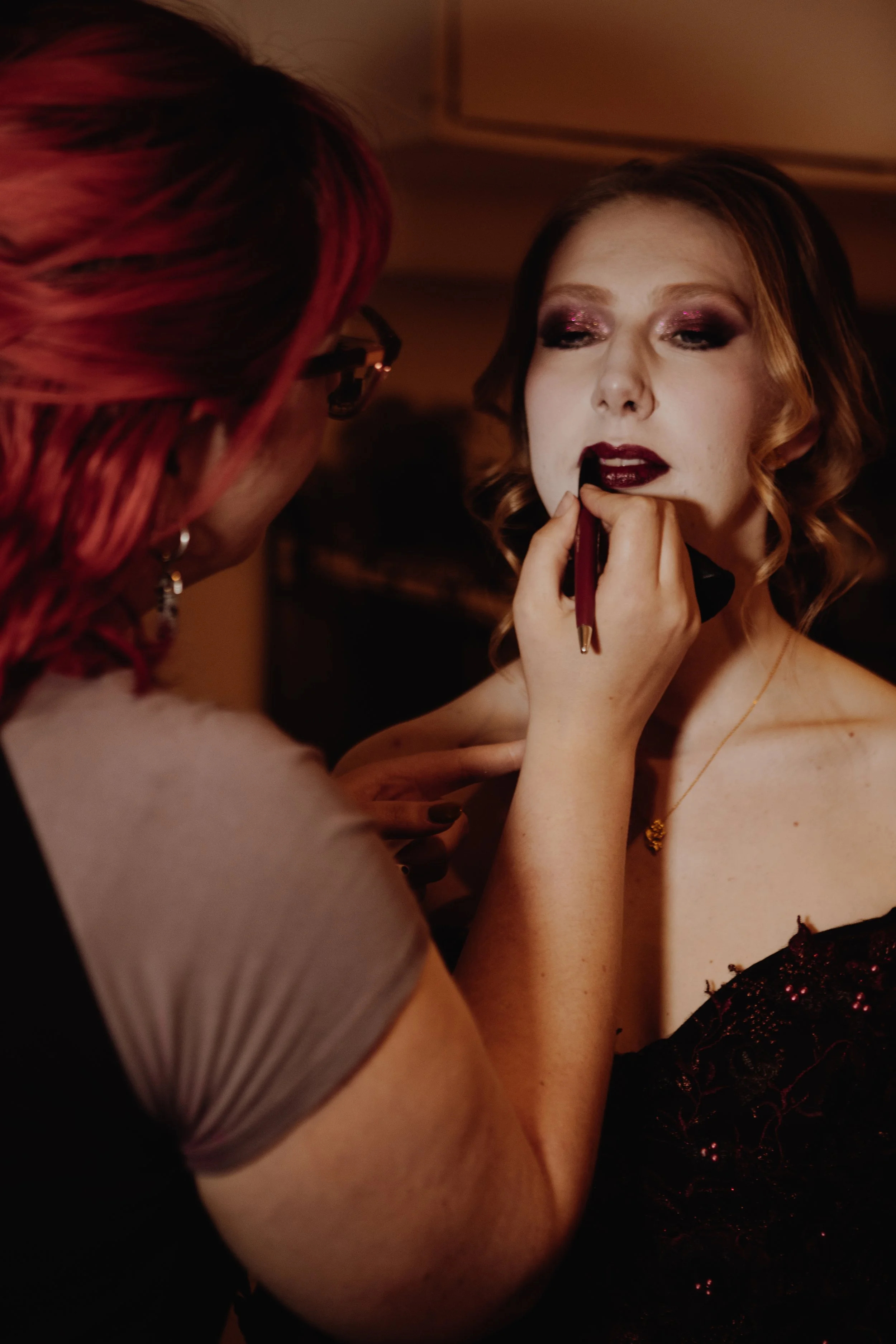 Katie Gale working on Ruby Gothic Makeup. 
Photo by Laura Fitzgerald.