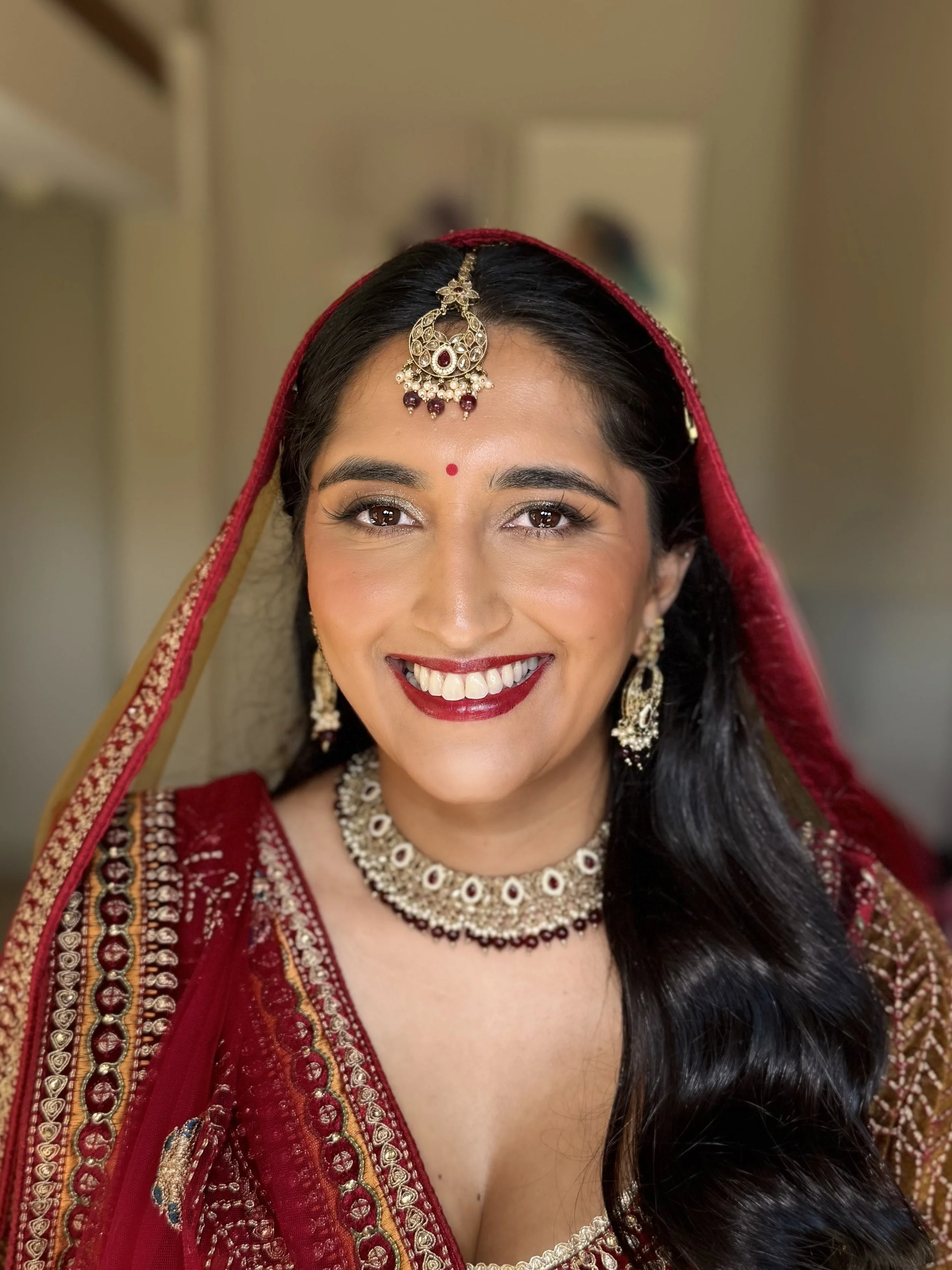 Golden full glam and red lip. 
Photo by Katie Gale.