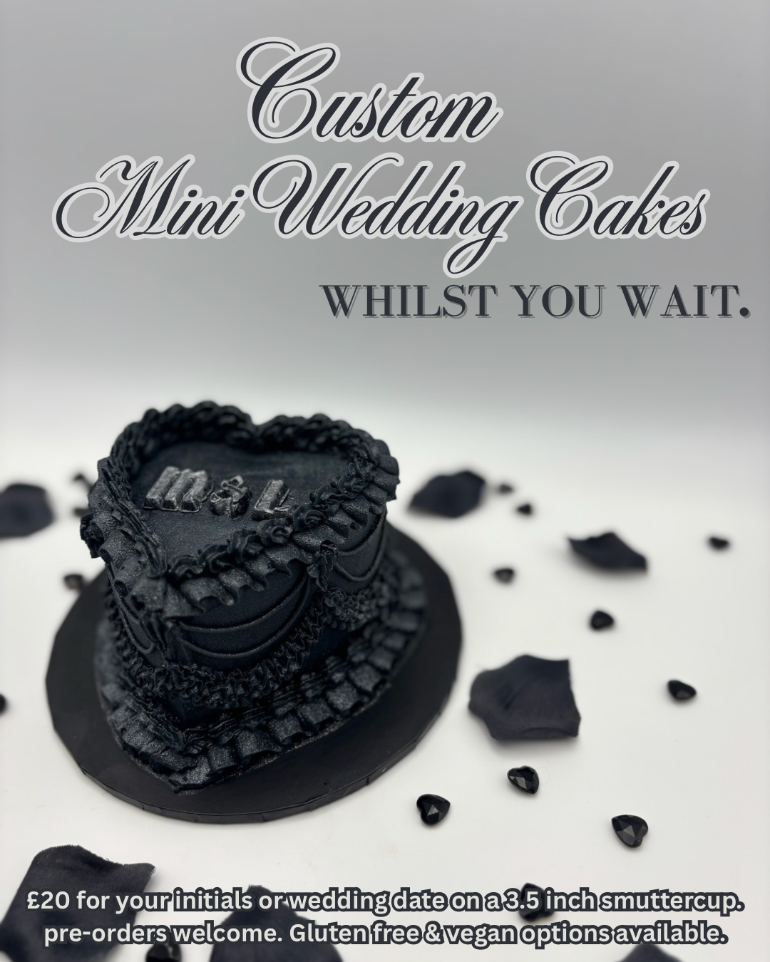 A black mini wedding cake decorated with black icing, surrounded by black stones and ribbons, with promotional text for customized mini wedding cakes.