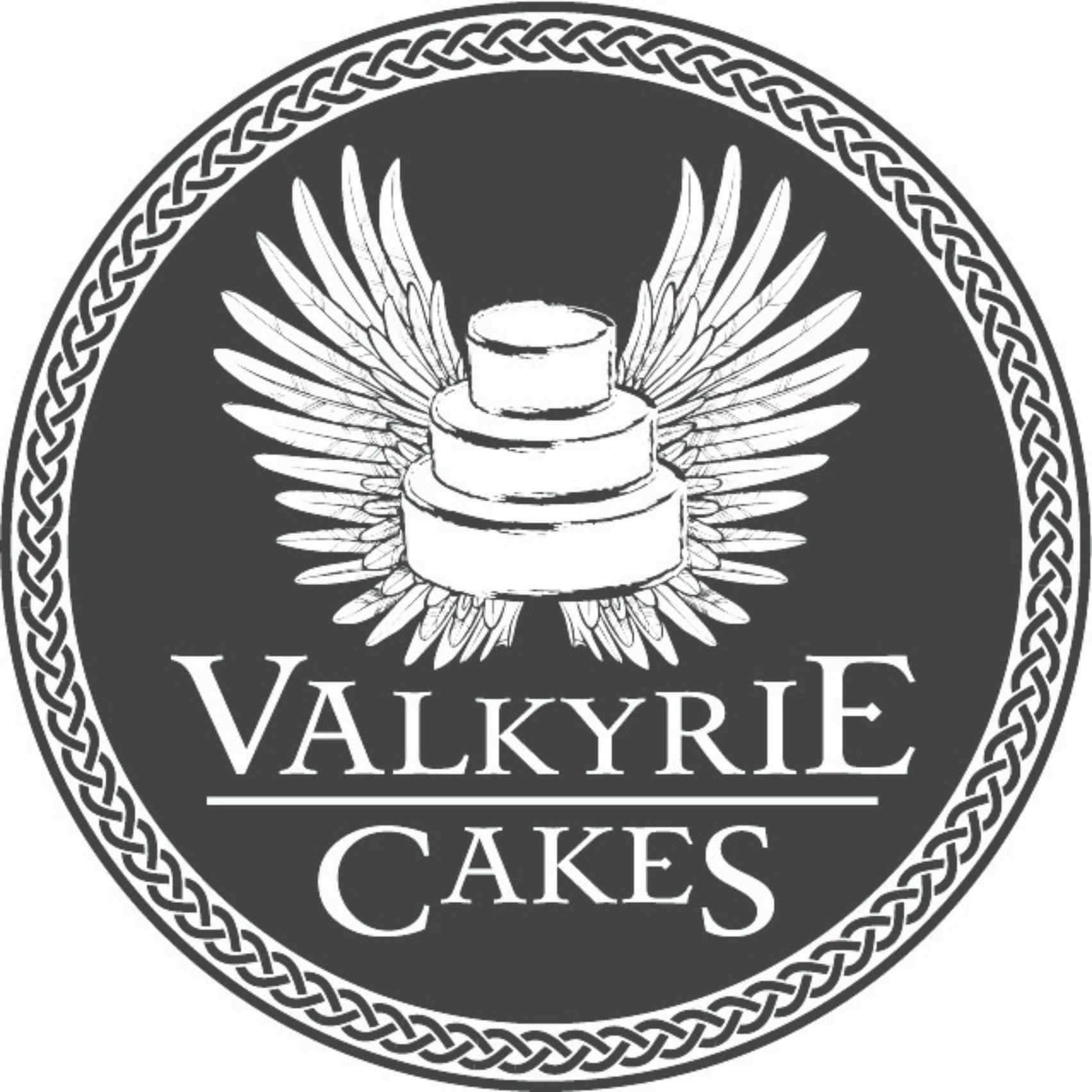 A circular logo for Valkyrie Cakes featuring a tiered cake with wings behind it and a decorative border, with the name "Valkyrie Cakes" written beneath the cake.